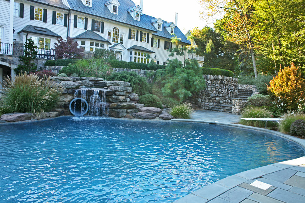 Inground pool with water feature in Franklin Lakes, NJ