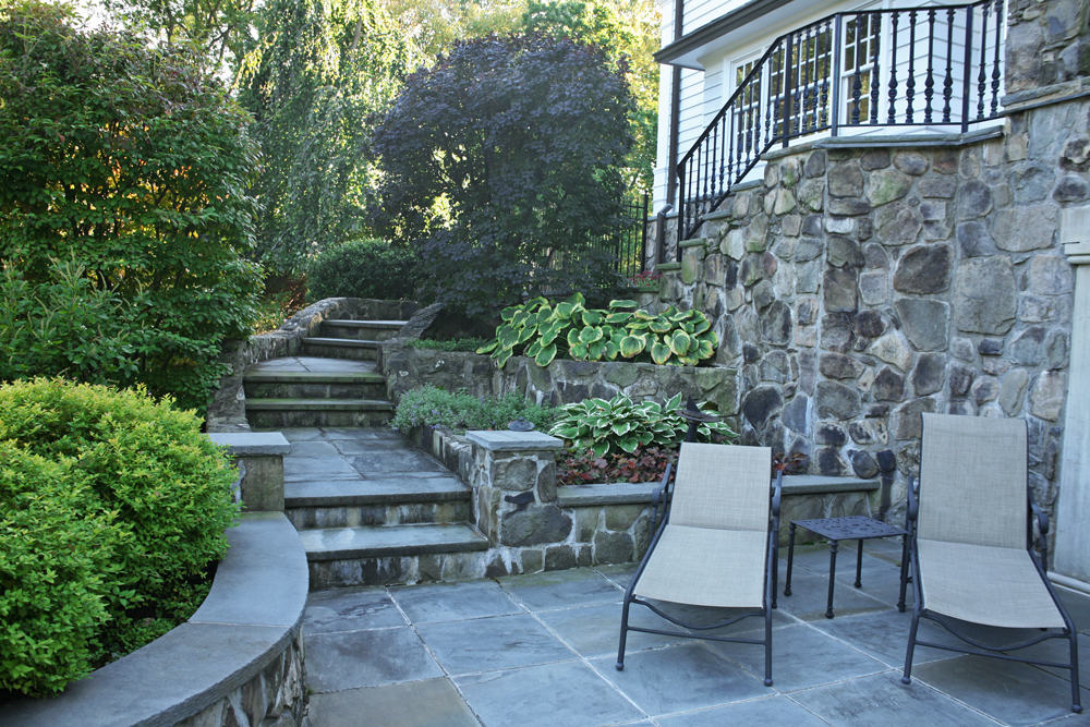 Paver patio and stone retaining wall in Franklin Lakes, NJ