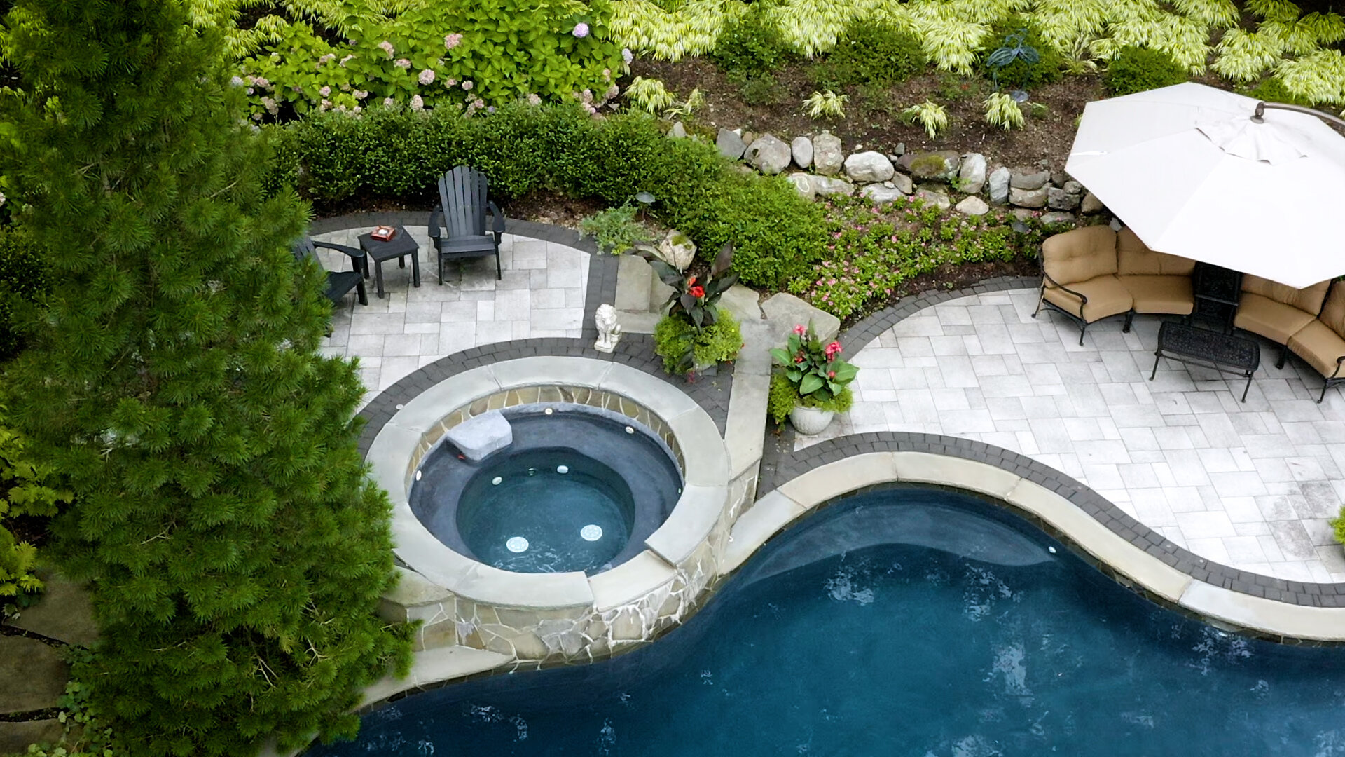 Landscape design with pool and spa in Mahwah, NJ