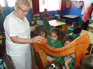 2 March 2015 - To mark the 150th anniversary of ‘Y Wladfa’ the Welsh settlement in Patagonia, Elinor Bennett delivers one of two harps to the children Ysgol Meithrin Trelew. Read More