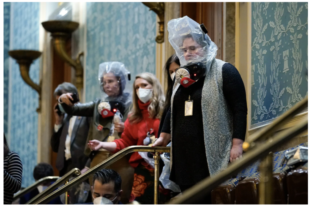 Capitol Hill Riot politicans gas masks Andrew Harnik.png