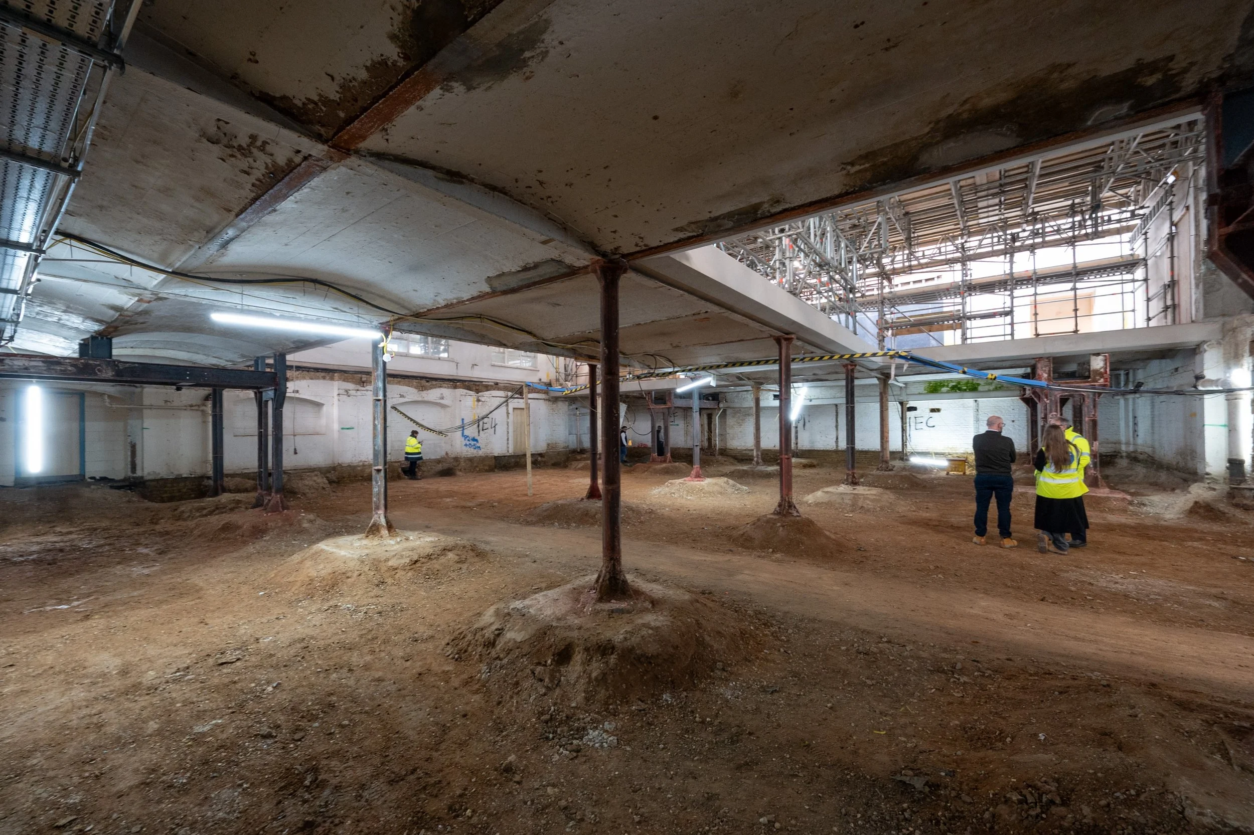   Queens’ Building, Queen Mary University of London : Our structural engineers justified the retention of the original cast iron columns and jack arch ground floor, preventing their removal and replacement in reinforced concrete.  