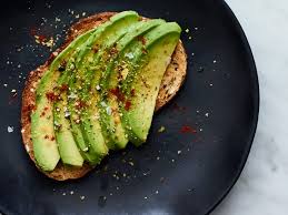 Avocado Toast, sprinkled with chili flakes and sea salt. Drizzle with balsamic vinegar!