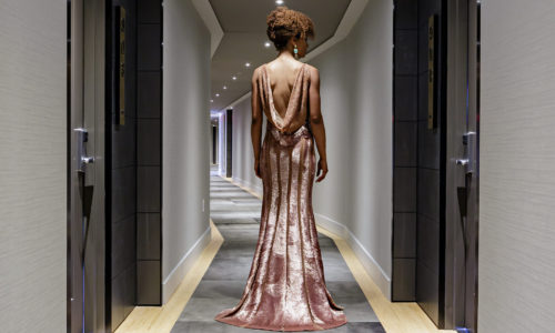 ARR_Amenities_Hallway_Woman_1920x1200-500x300.jpg