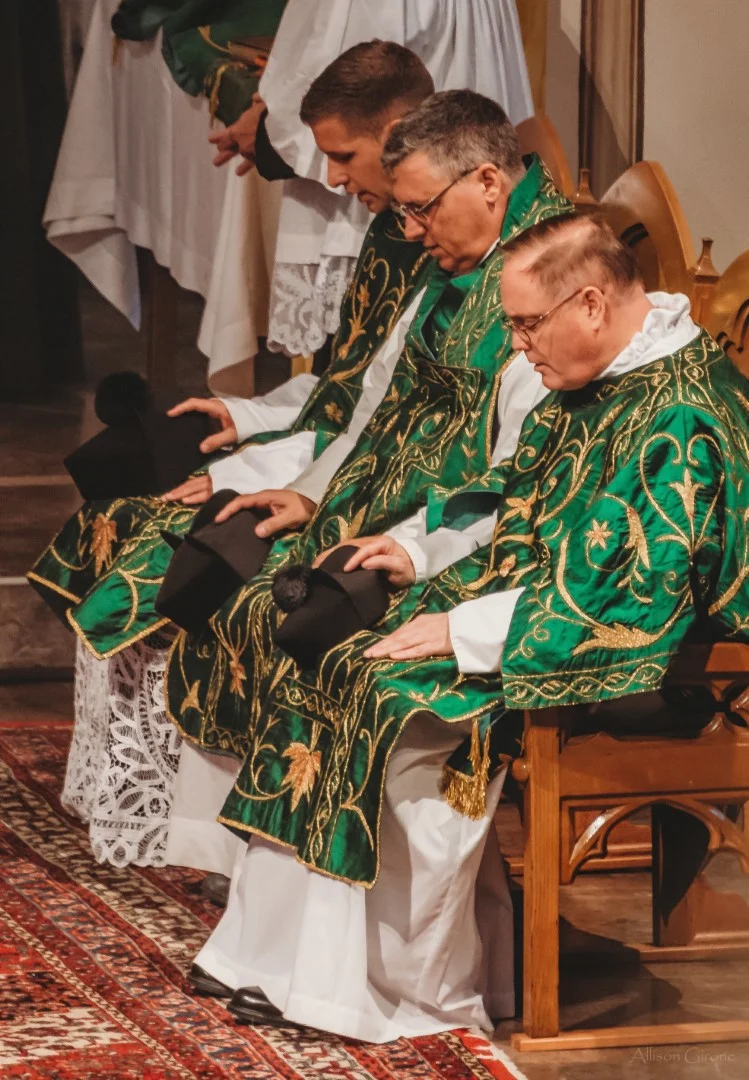 FSSP LatinMass St. Marys 3 priest sitting-1.jpg