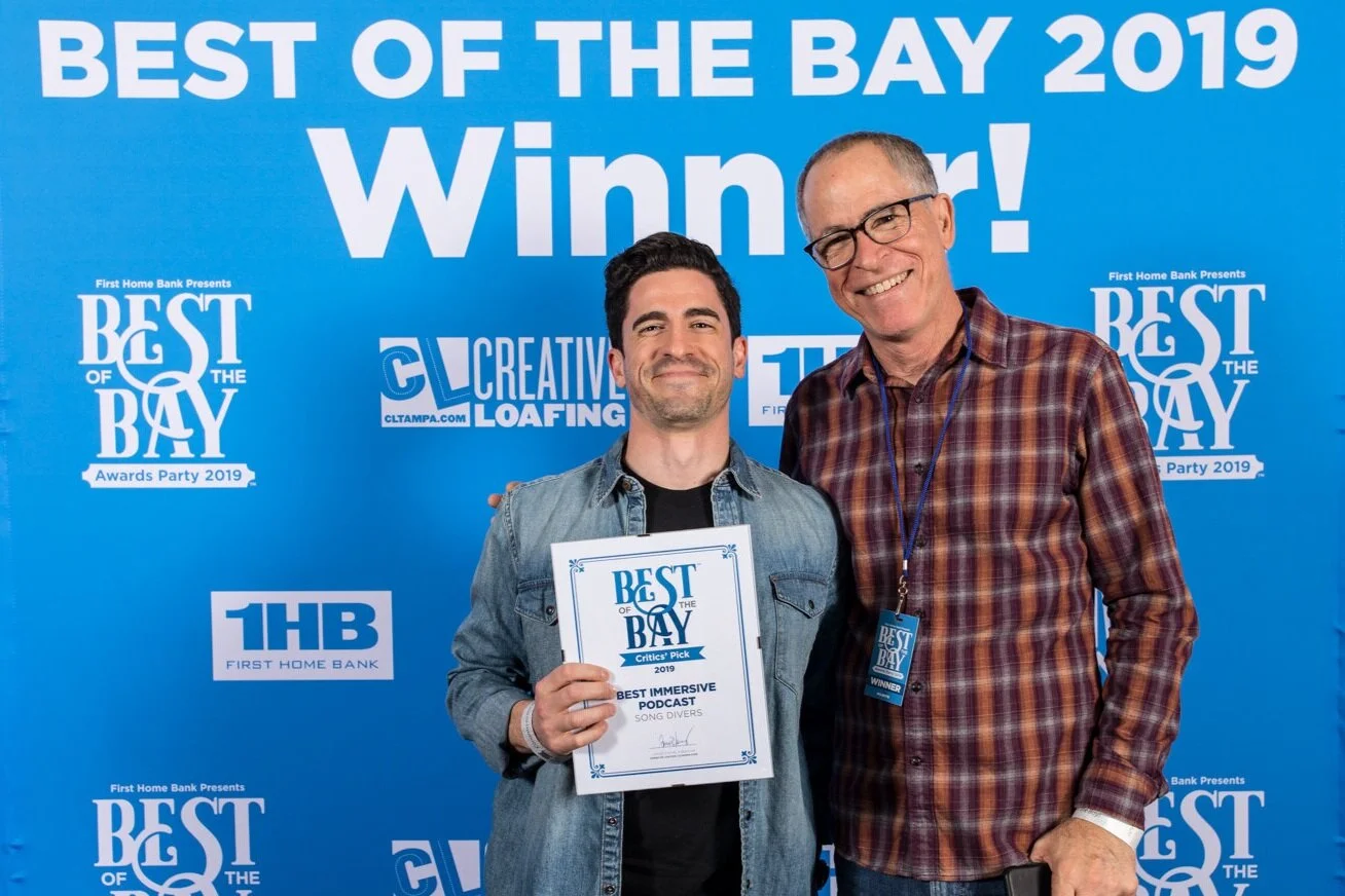 Stef & Ed pose for the cameras while accepting Best Immersive Podcast Award.