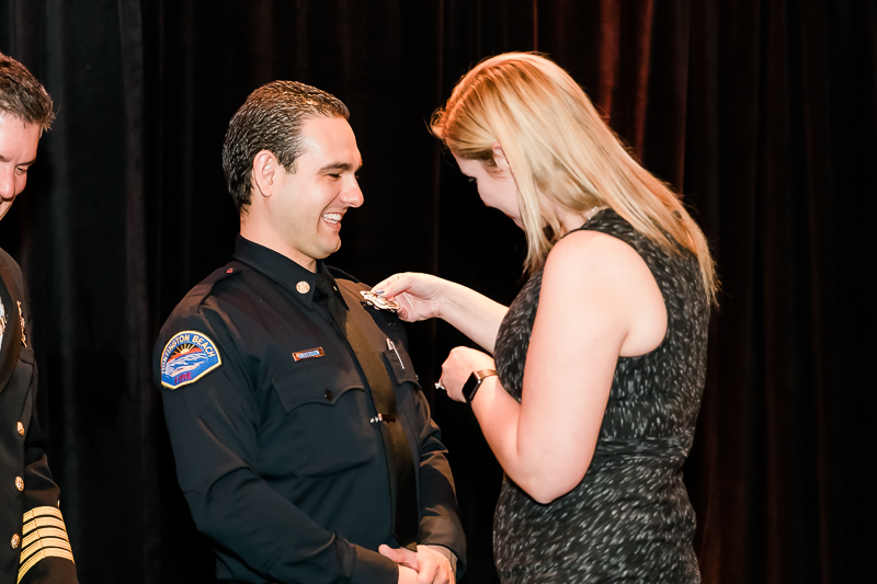  New badges were pinned on by significant others and family members. 