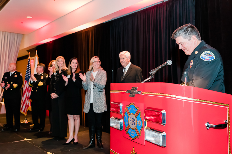 City council members and dignitaries joined the stage for the presentation of awards.