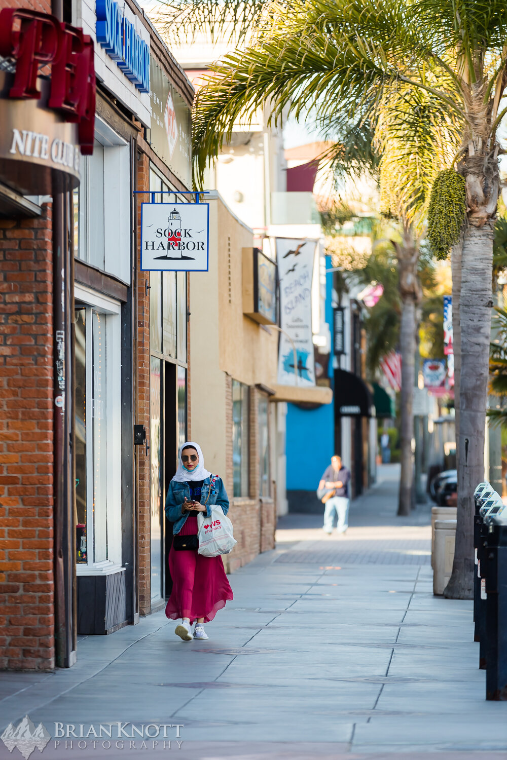 With all non-essential stores being closed, streets have become desolate. Main Street in Huntington Beach would normally embody crowded sidewalks.