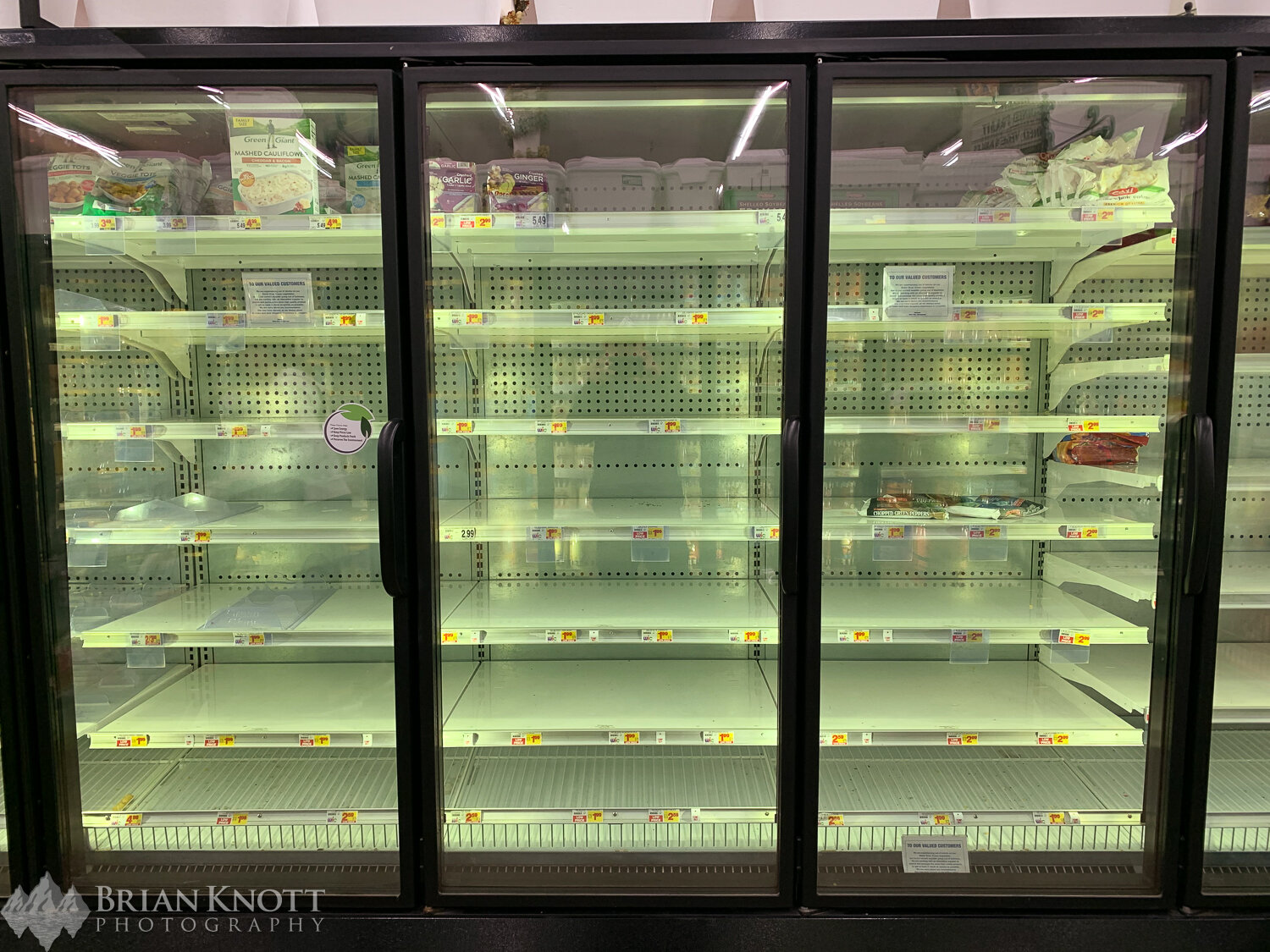 Like in true apocalypse style, grocery store shelves are next to empty as people stock up on food.