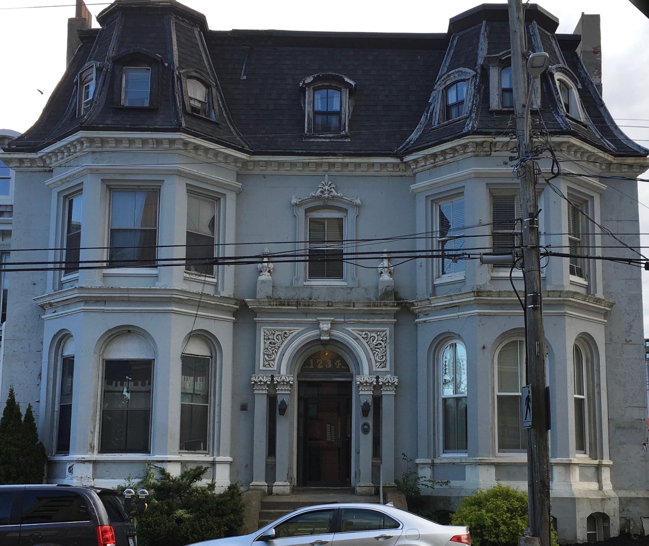 Talk about a character home! My bedroom window is the top right one.