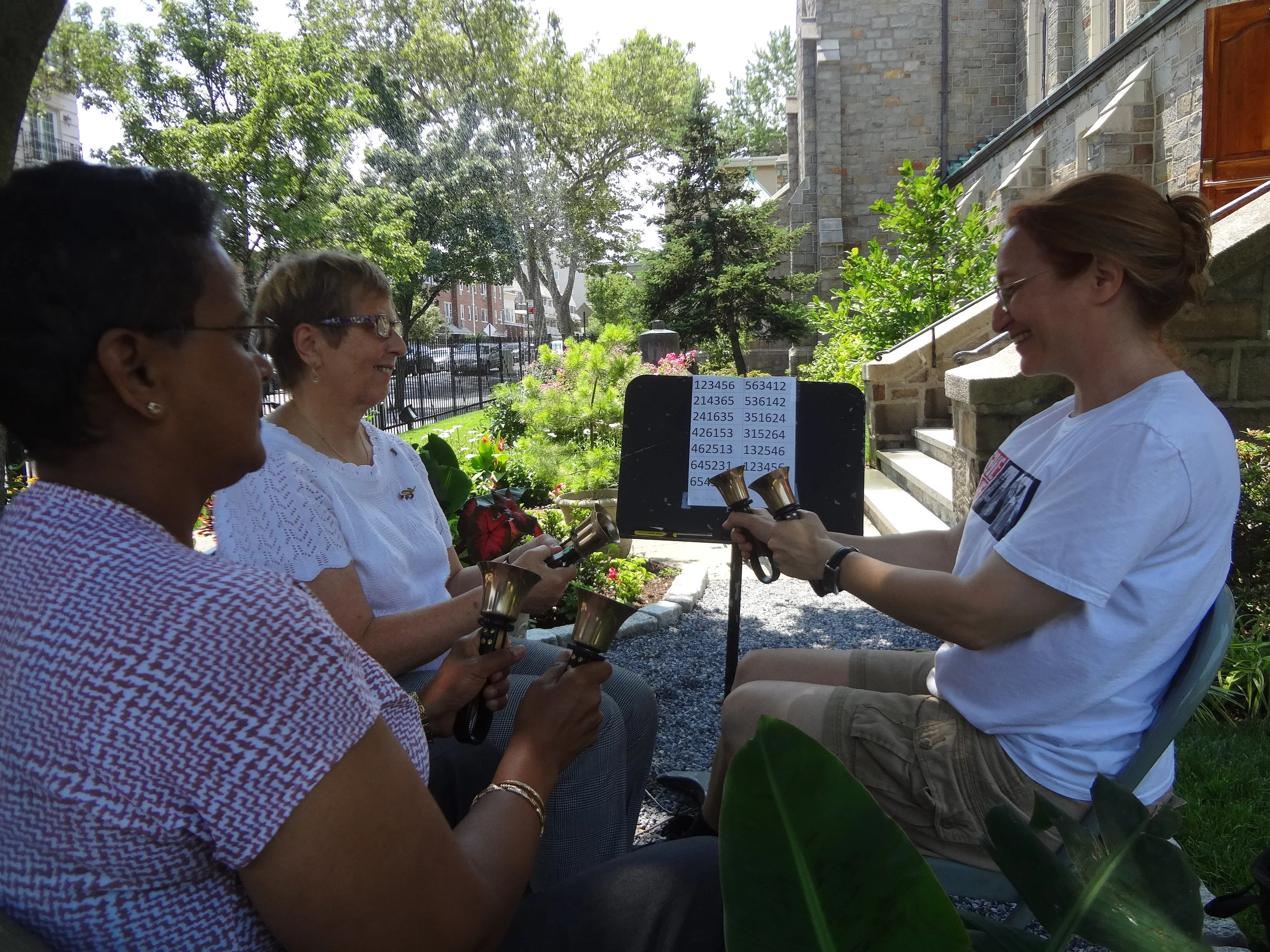 Natalia teaching handbells.JPG