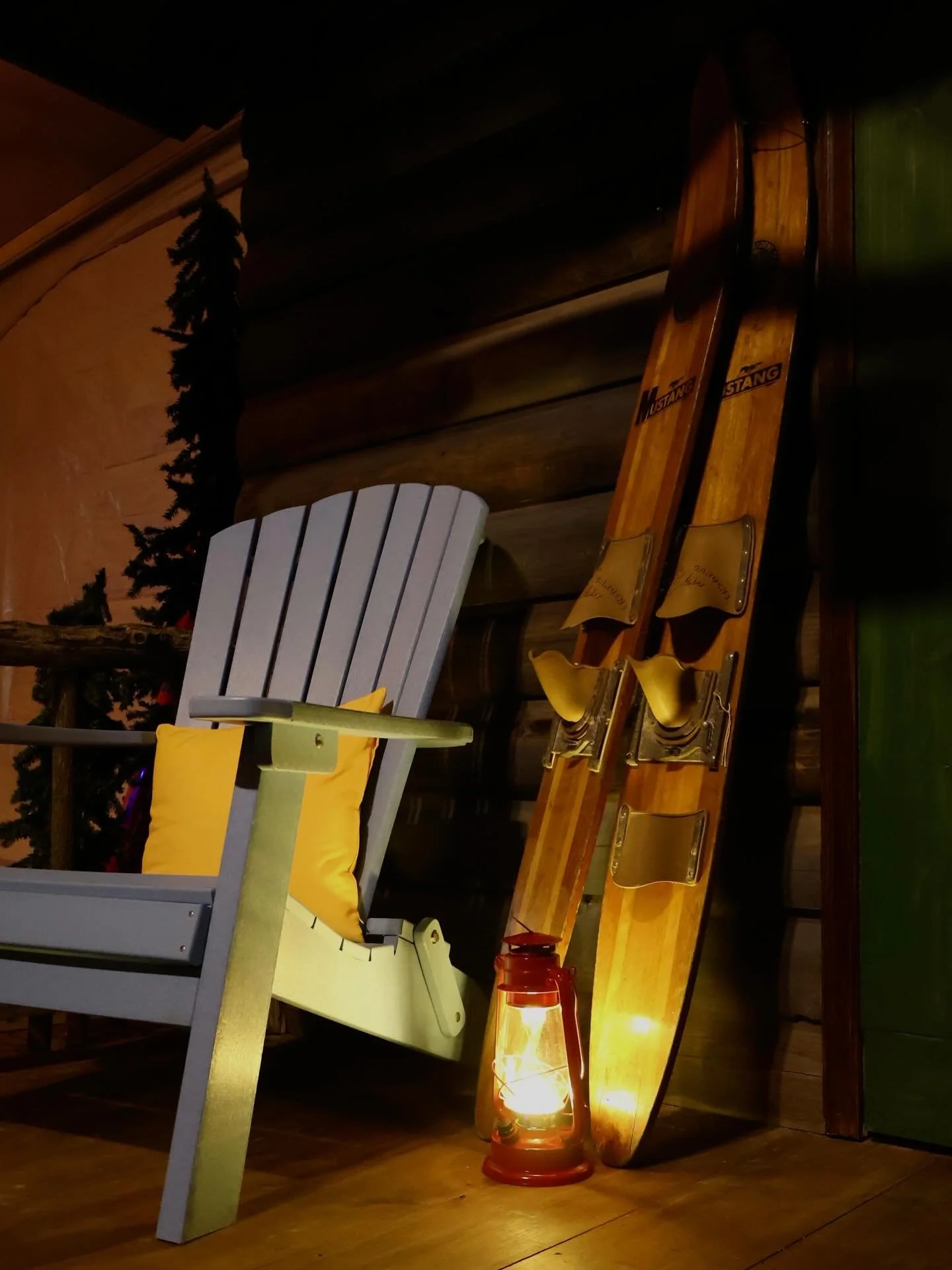 Developing a theme to life starts from the ground up- quite literally. For this custom pop-up cabin, every detail was hand-selected to tell a cohesive story: vintage skis, lanterns, rustic chairs, real canoes, and custom signage all came together to