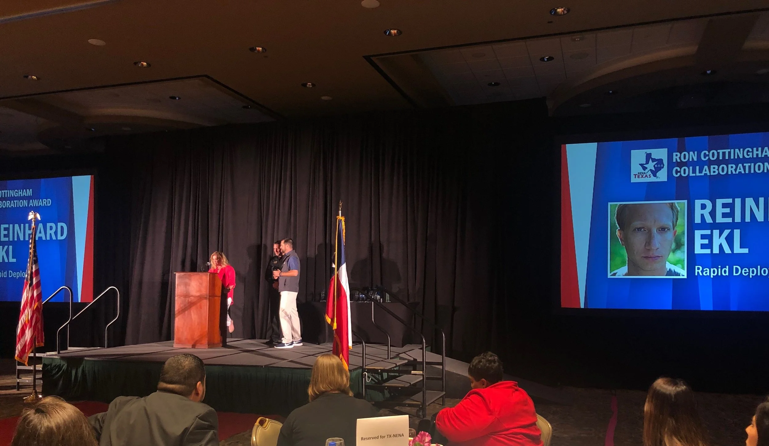 Ryan Chambers with RapidDeploy accepting the award on behalf of Reinahard Ekl