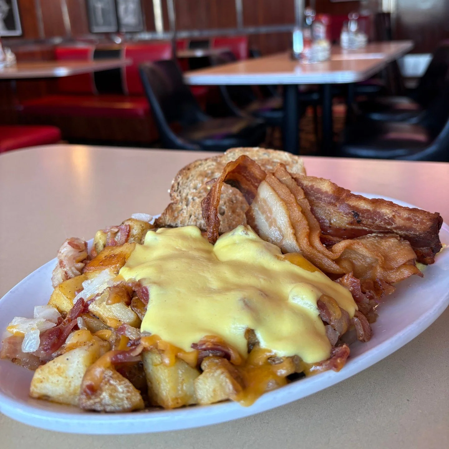 Start your morning right with the Roadside Skillet:
Two eggs your way over home fries, onions, peppers, bacon, cheddar, and hollandaise, served with your choice of toast
Breakfast dreams, served on a plate 🍳✨