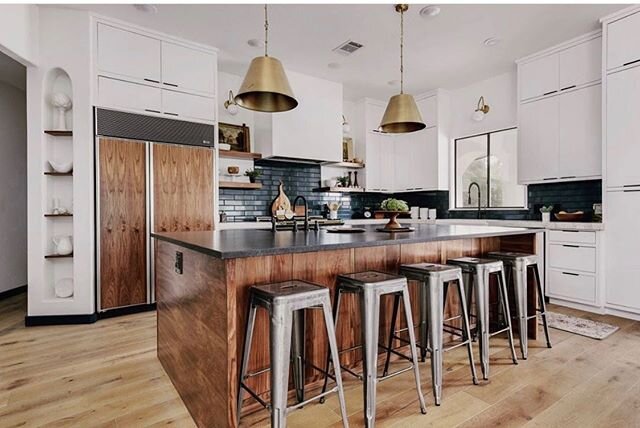 We love Walnut! The Walnut cabinets on this island really add a rich color to the kitchen. White is always beautiful, but so nice to see wood added to the kitchen. What do you think?
