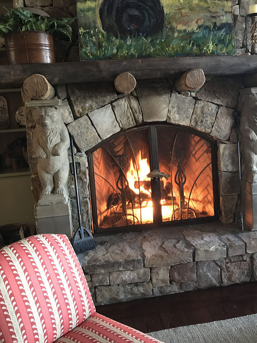 A cozy fireplace in a Lake Rabun home