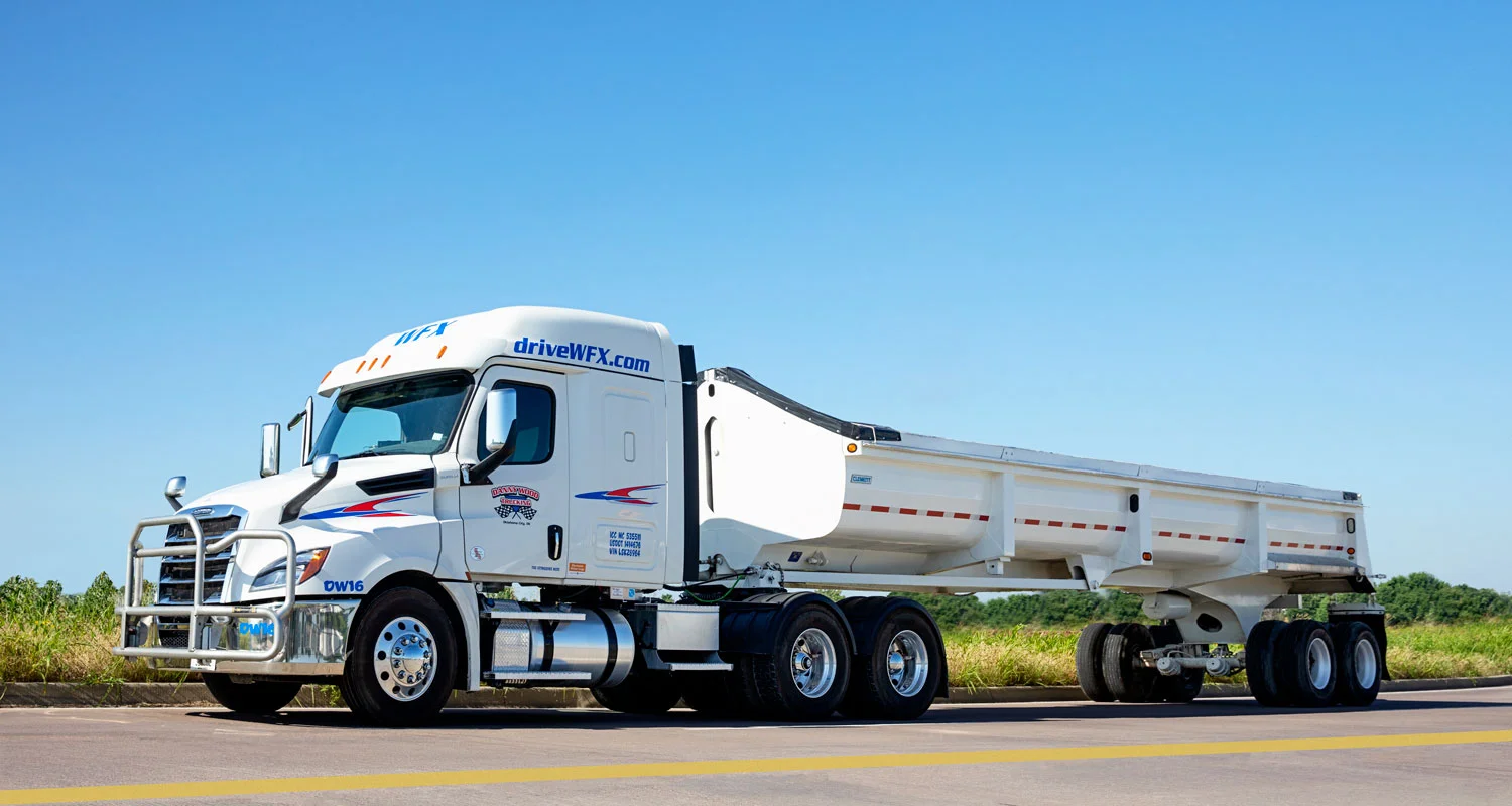 Cascadia tractor with End dump trailer