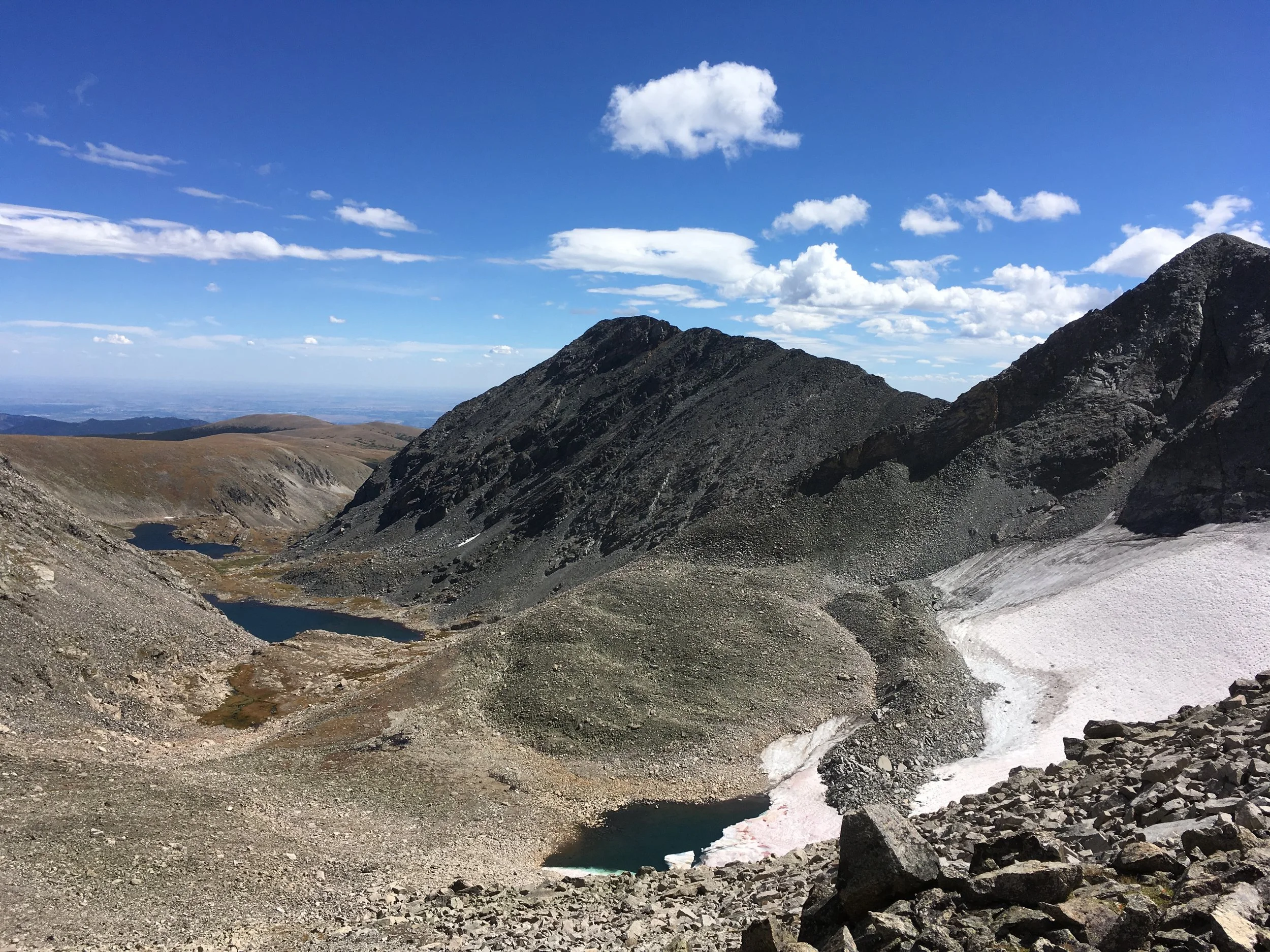 Factors controlling the water quality of rock glacier springs in European and American mountain ranges