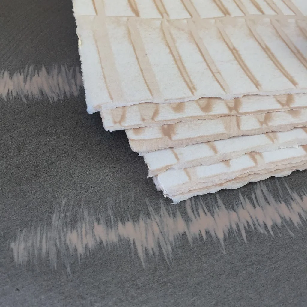 Hand Painted Sheet Wallpaper by Sarah and Ruby features deckled (rough) edges, designed to overlap and show to emphasize the artistry of each sheet.