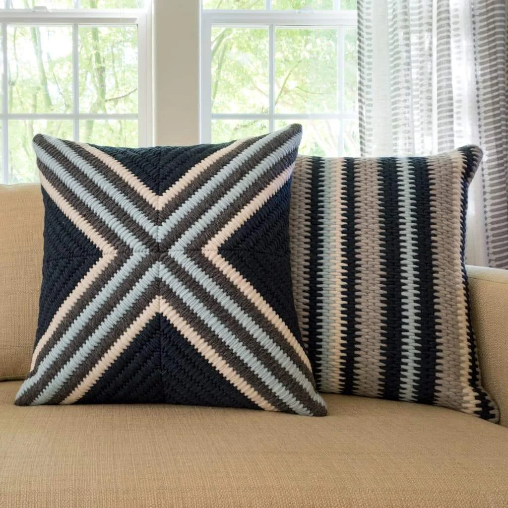 Navy blue cross textured pillow and navy blue stripe textured pillow. Each 20"x20"