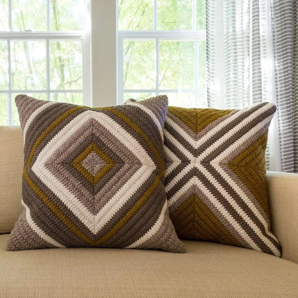 Ochre Diamond and Ochre Cross throw pillows. Each 20"x20".
