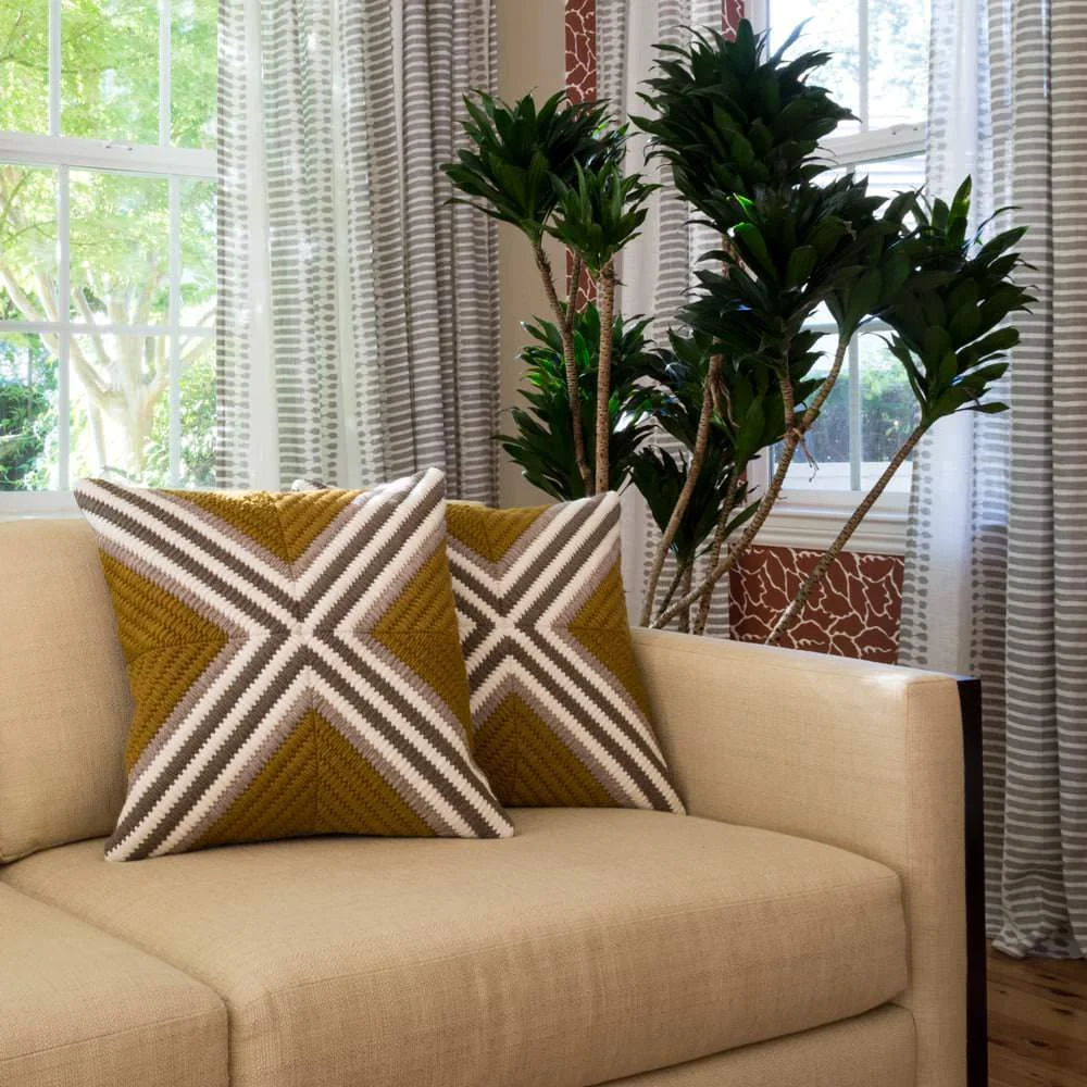 Textured needlepoint throw pillows in Ochre. Made from wool/alpaca.