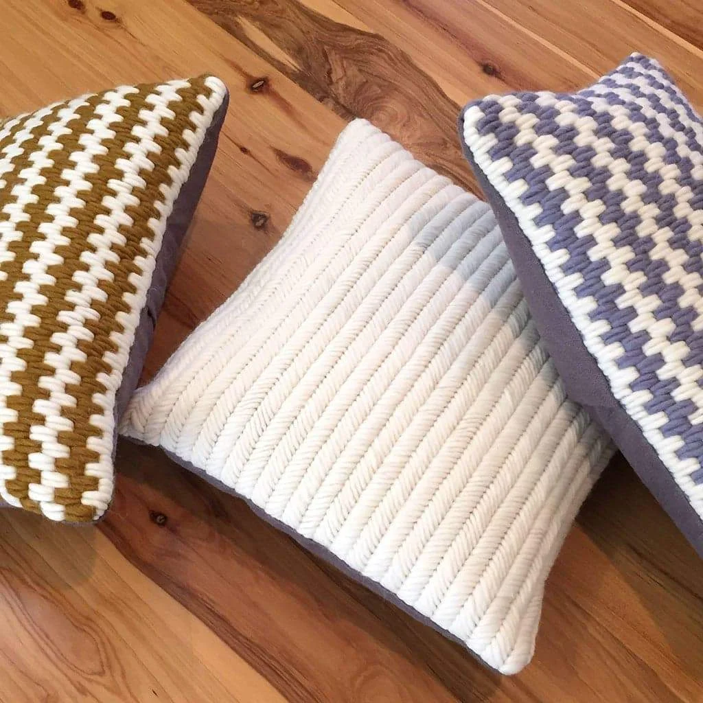Artisan made hand-stitched textured pillows. Wool and linen.
