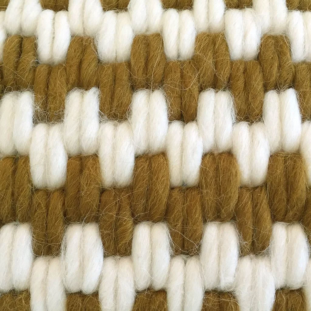 Detail view of artisan made hand-stitched textured pillows in lavender stripe. Wool and linen.