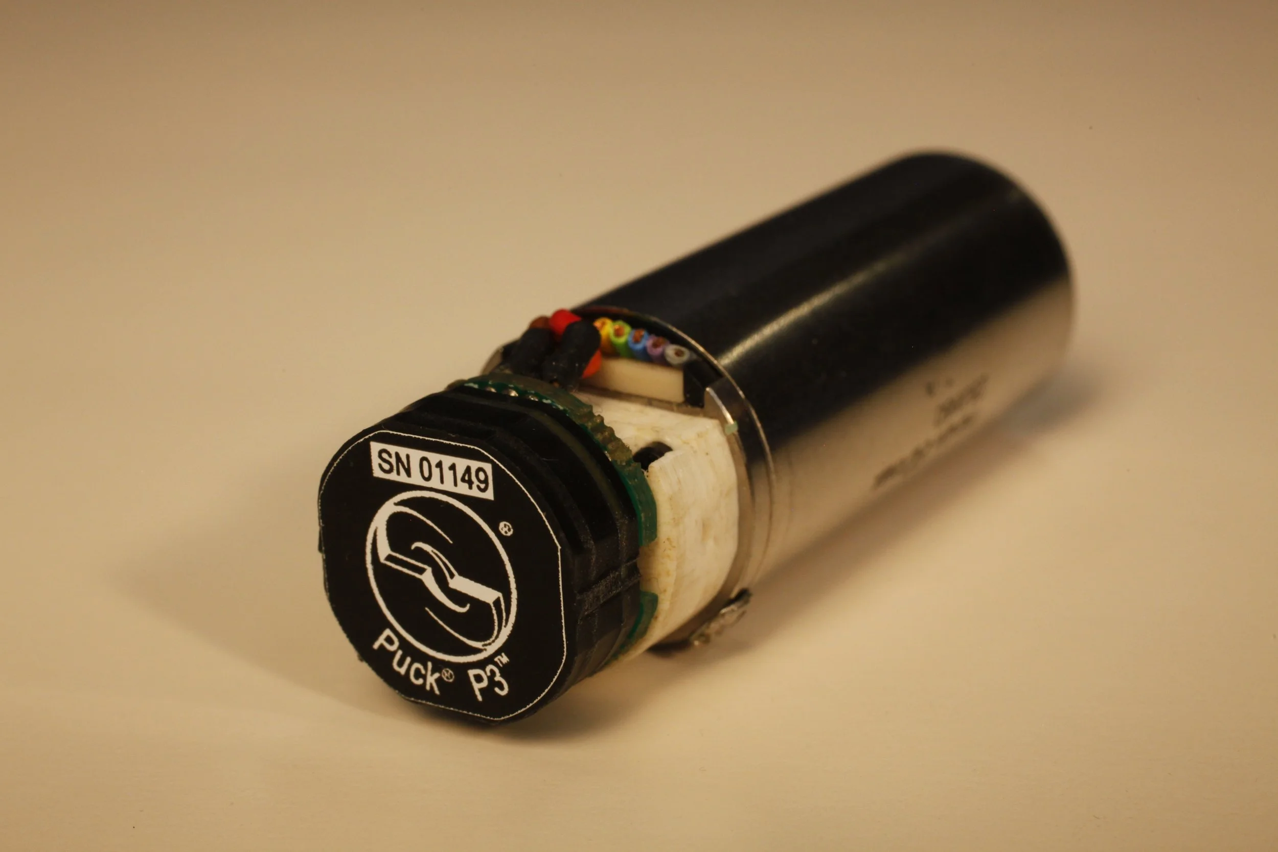 3rd-generation Puck® brushless motor controller, weighing only 2.5 grams, by far the world's smallest.