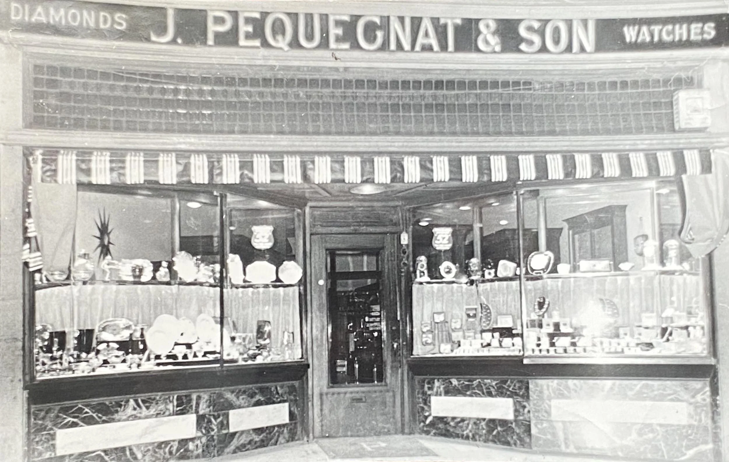 J. Pequegnat &amp; Son store facade in the 1920s.