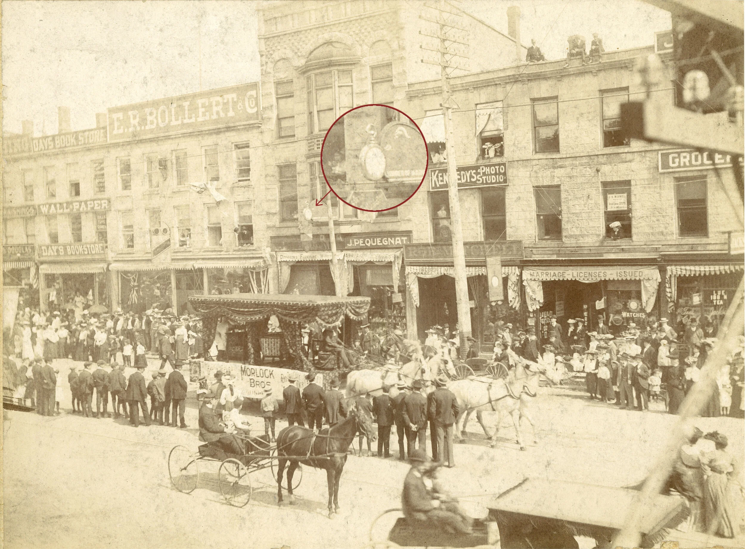 The ‘Joseph Pequegnat &amp; Son’ pocket watch trade sign is pictured hanging above the J. Pequegnat storefront before its disappearance.