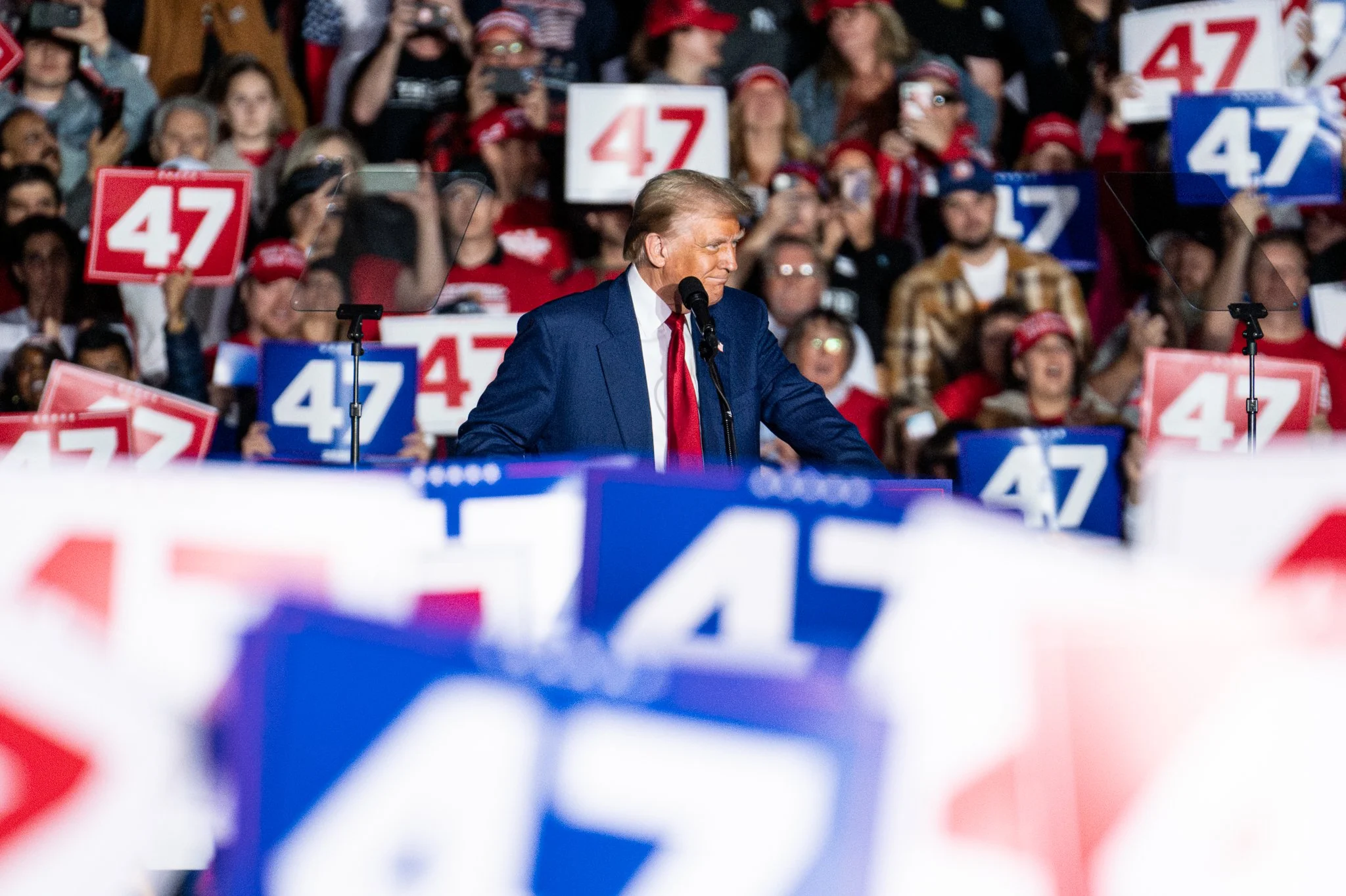 Republican presidential nominee Donald Trump greets supporters before giving remarks during a campaign rally at the Suburban Collection Showplace in Novi. Mich. on Oct. 16, 2024. During the event, Trump was joined on stage by several local Muslim and