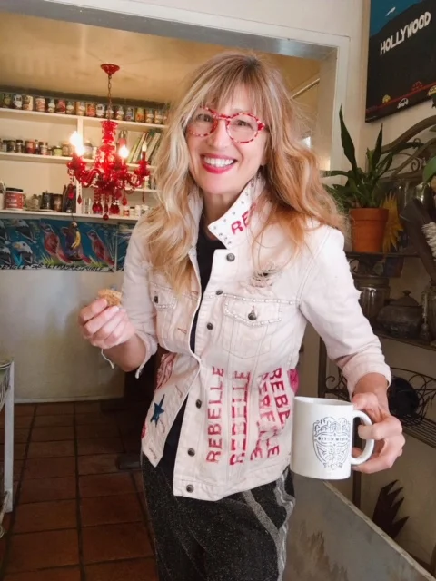 Angie Weihs in custom Rebelle denim jacket and coffe mug