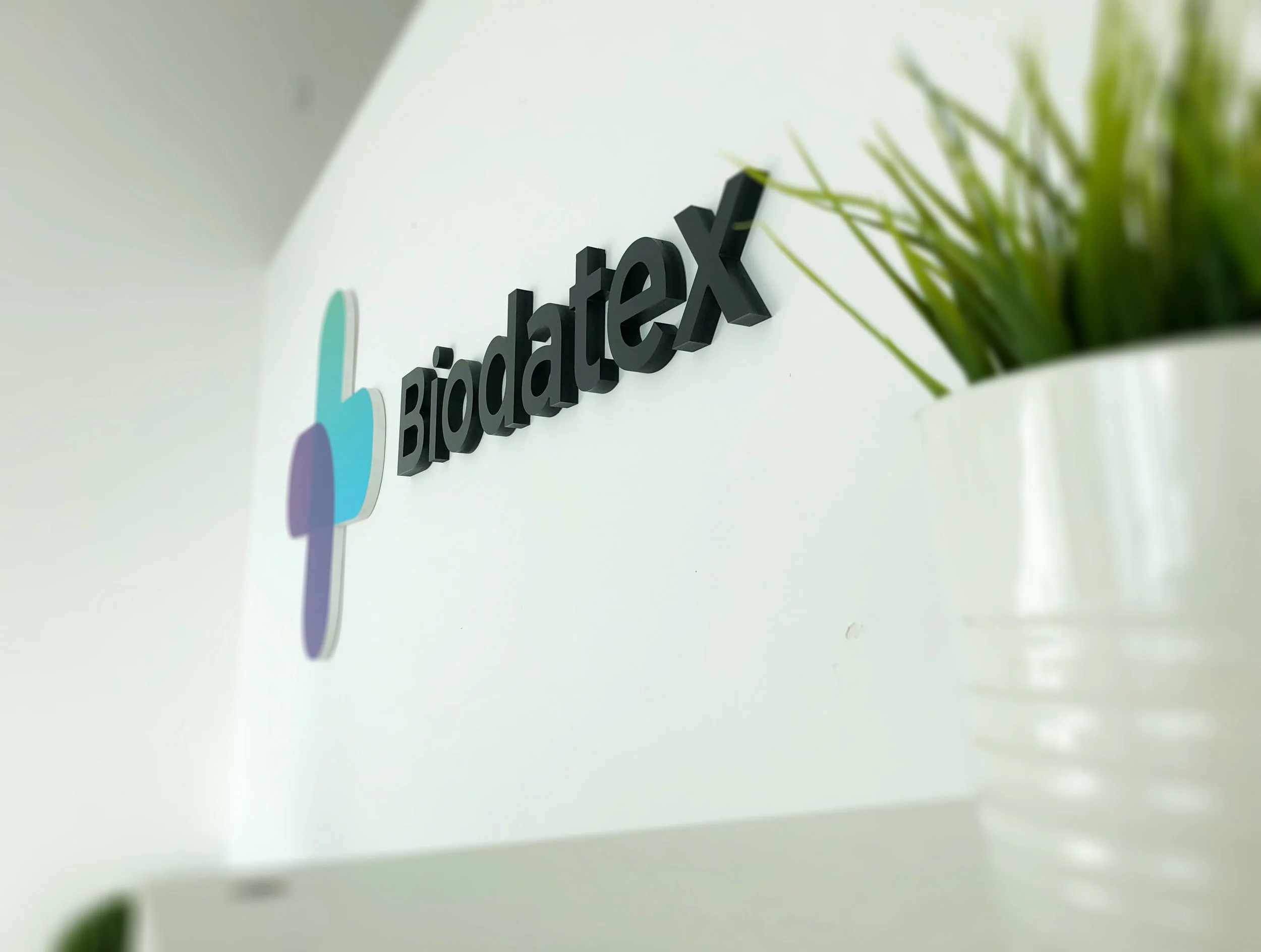 one inch thick PVC dimensional letters cut for Biodatex in Miami by Print Hub a sign shop