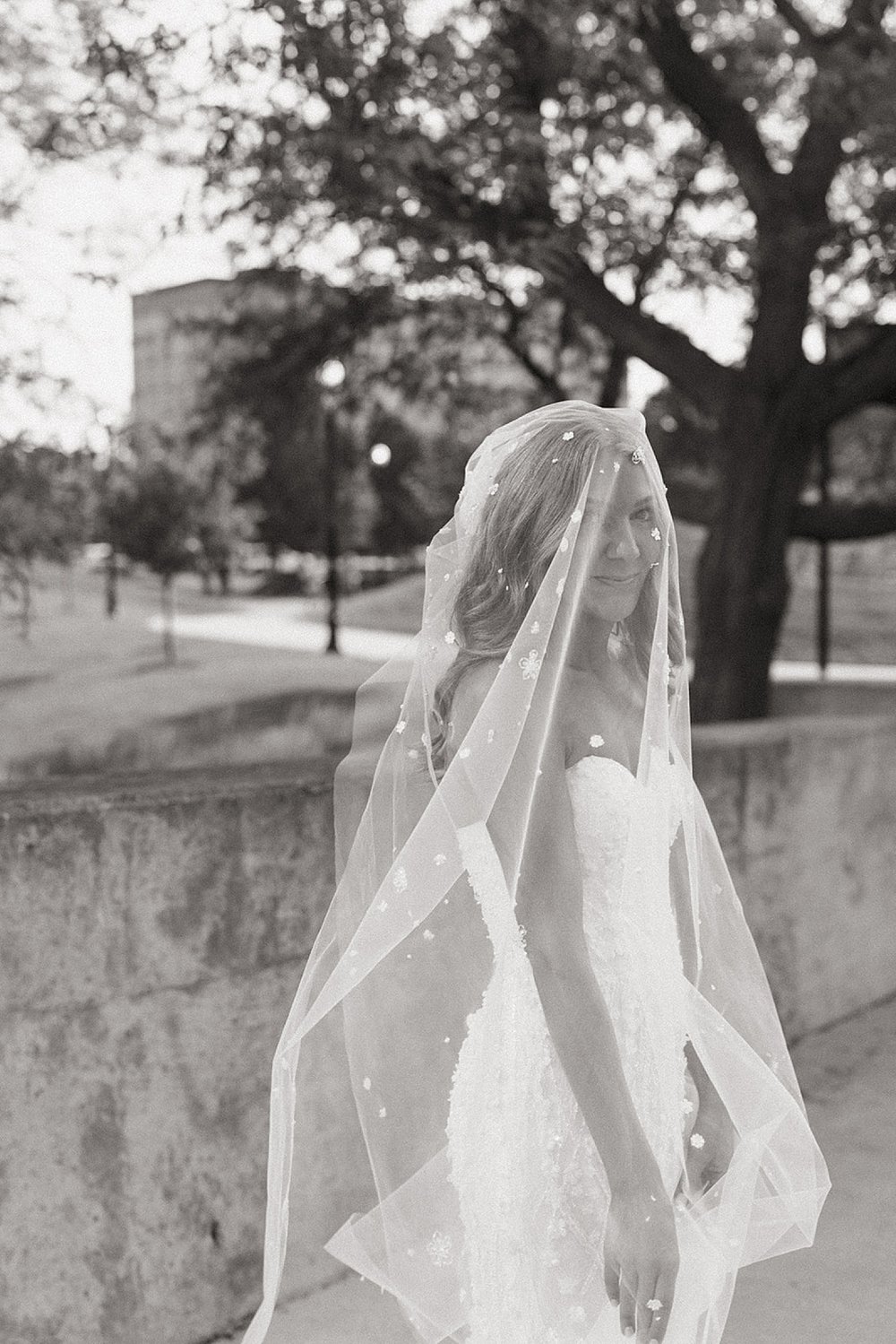  bride in strapless dress by Michigan wedding photographer 
