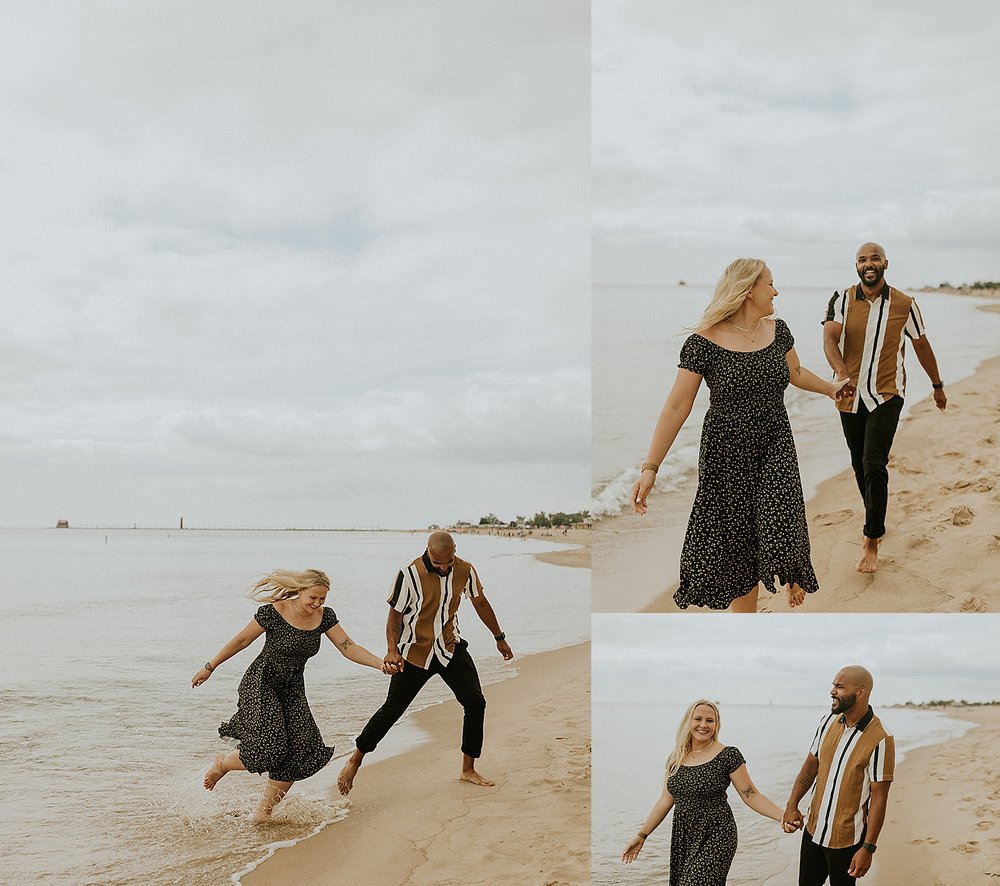  man and woman playing in the water by Steph Photo Co 