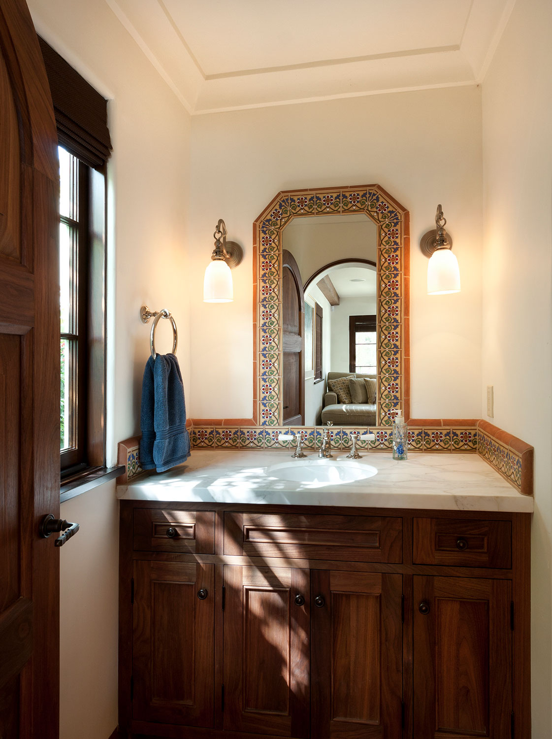 05-contemporary-spanish-bathroom-vanity-tile-mirror-gary-drake-general-contractor.jpg