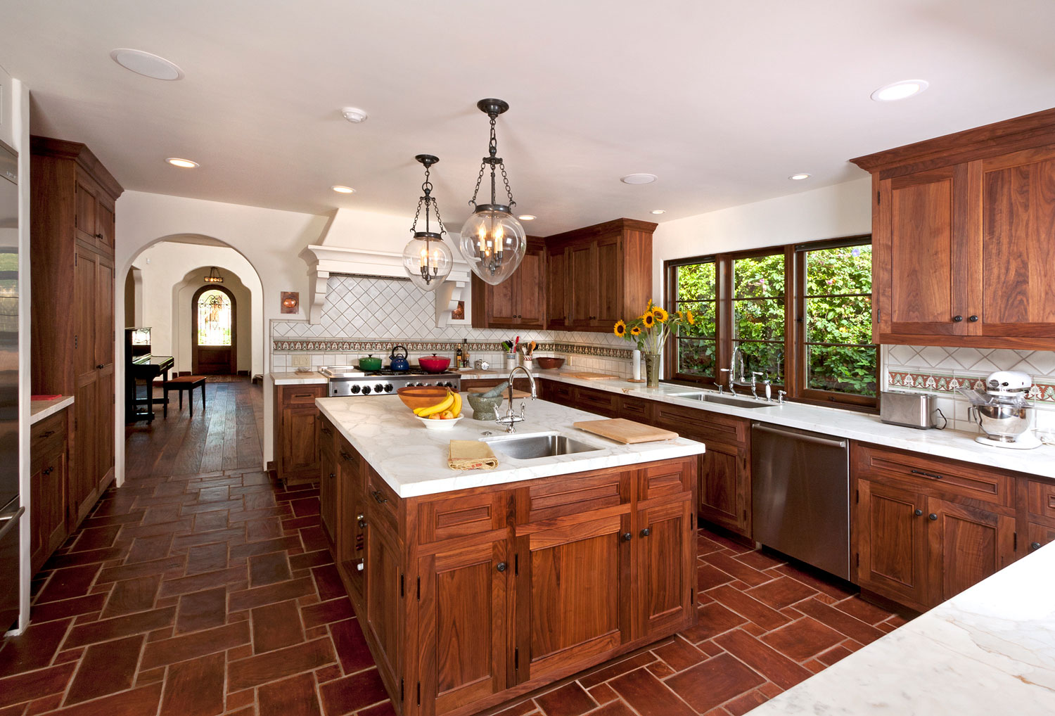 07-spanish-style-kitchen-tile-floor-marble-countertops-tile-backsplash-gary-drake-general-contractor.jpg