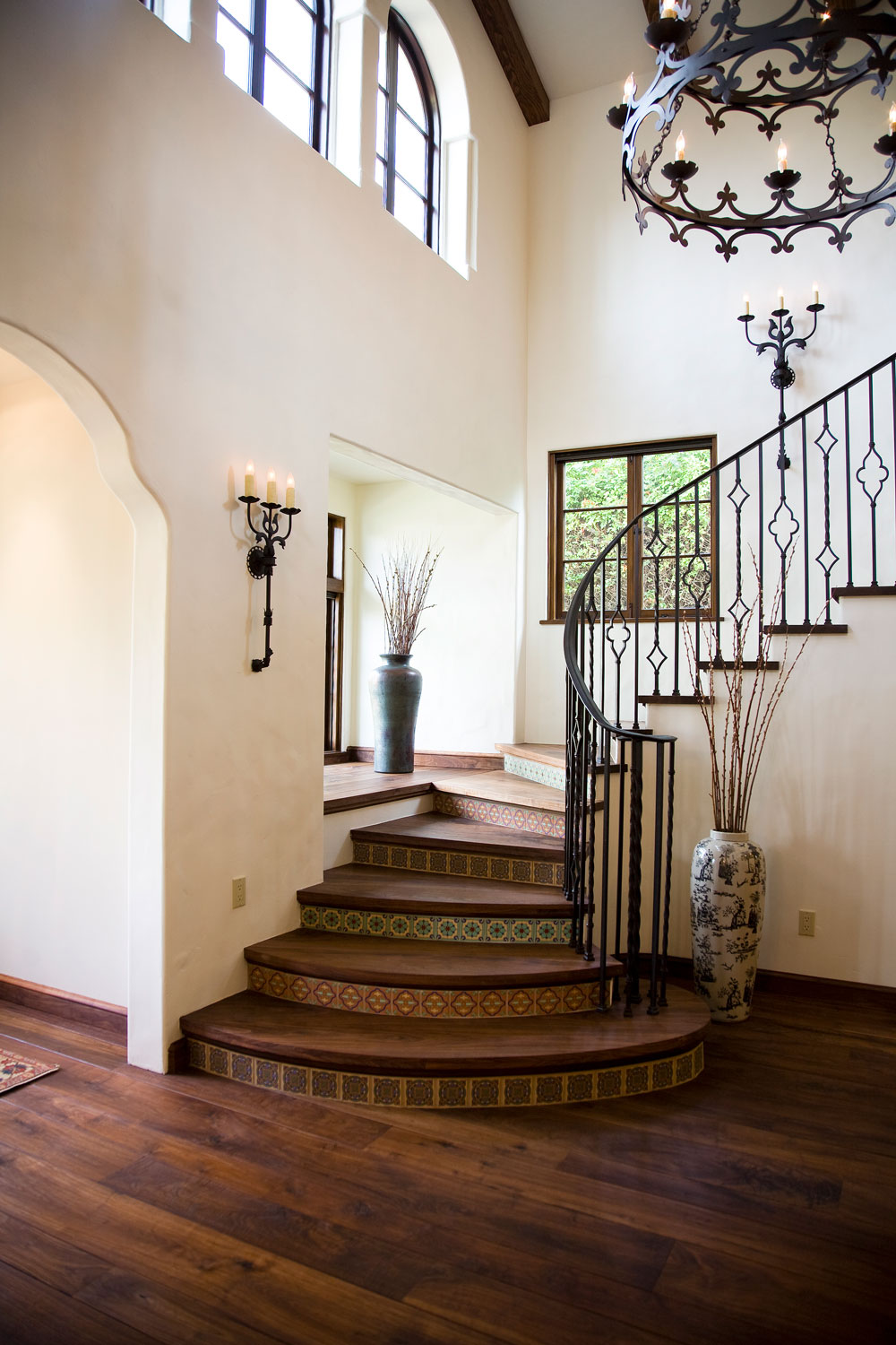 09-Spanish-style-staircase-tile-risers-iron-railing-gary-drake-general-contractor.jpg