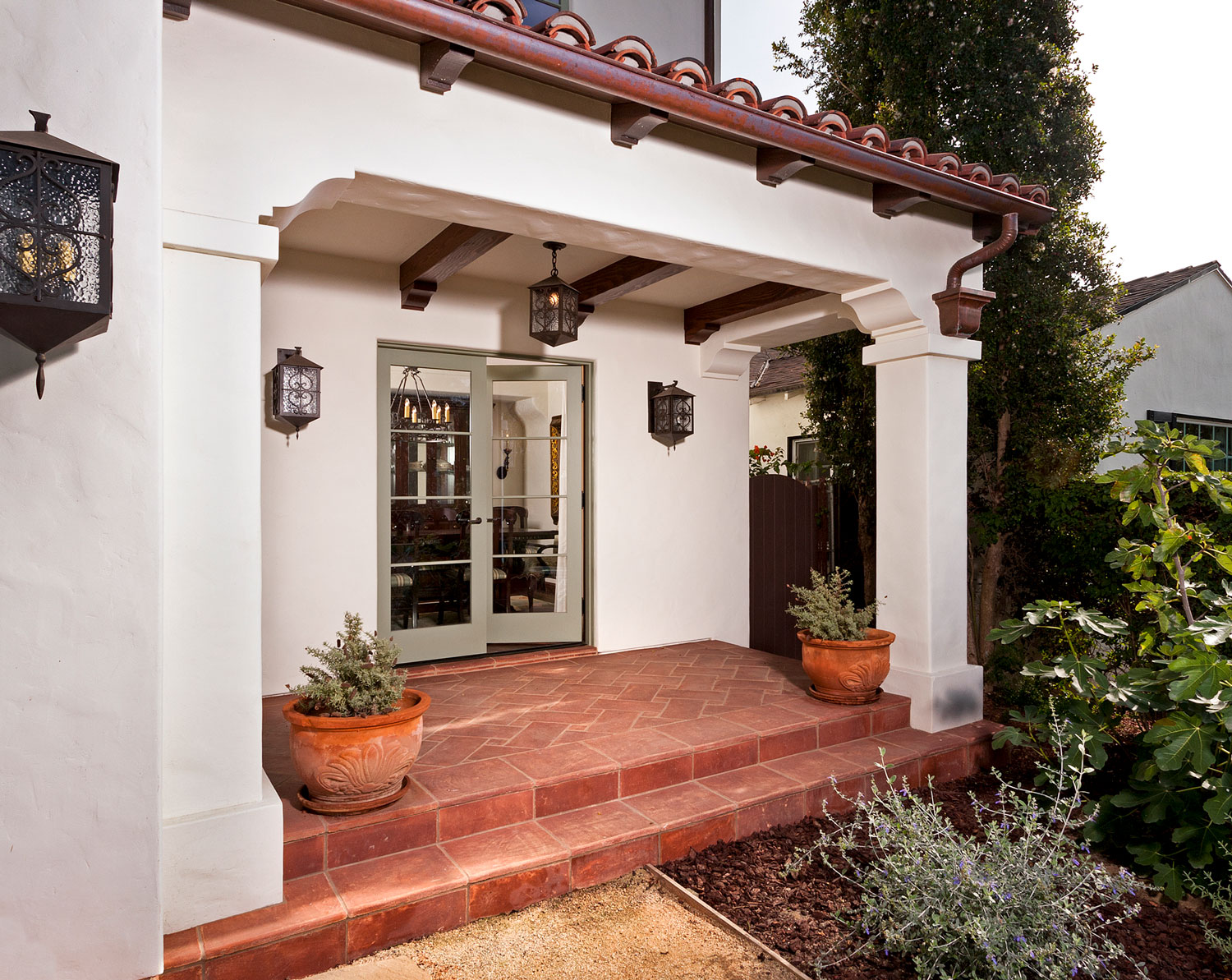 17-contemporary-spanish-tile-patio-french-doors-gary-drake-general-contractor.jpg
