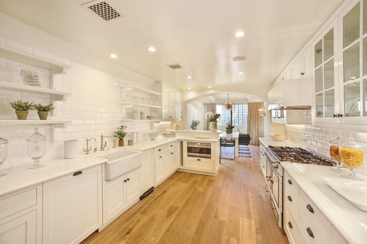03-white-retro-kitchen-subway-tile-white-countertops-exposed-shelves-gary-drake-general-contractor.jpg