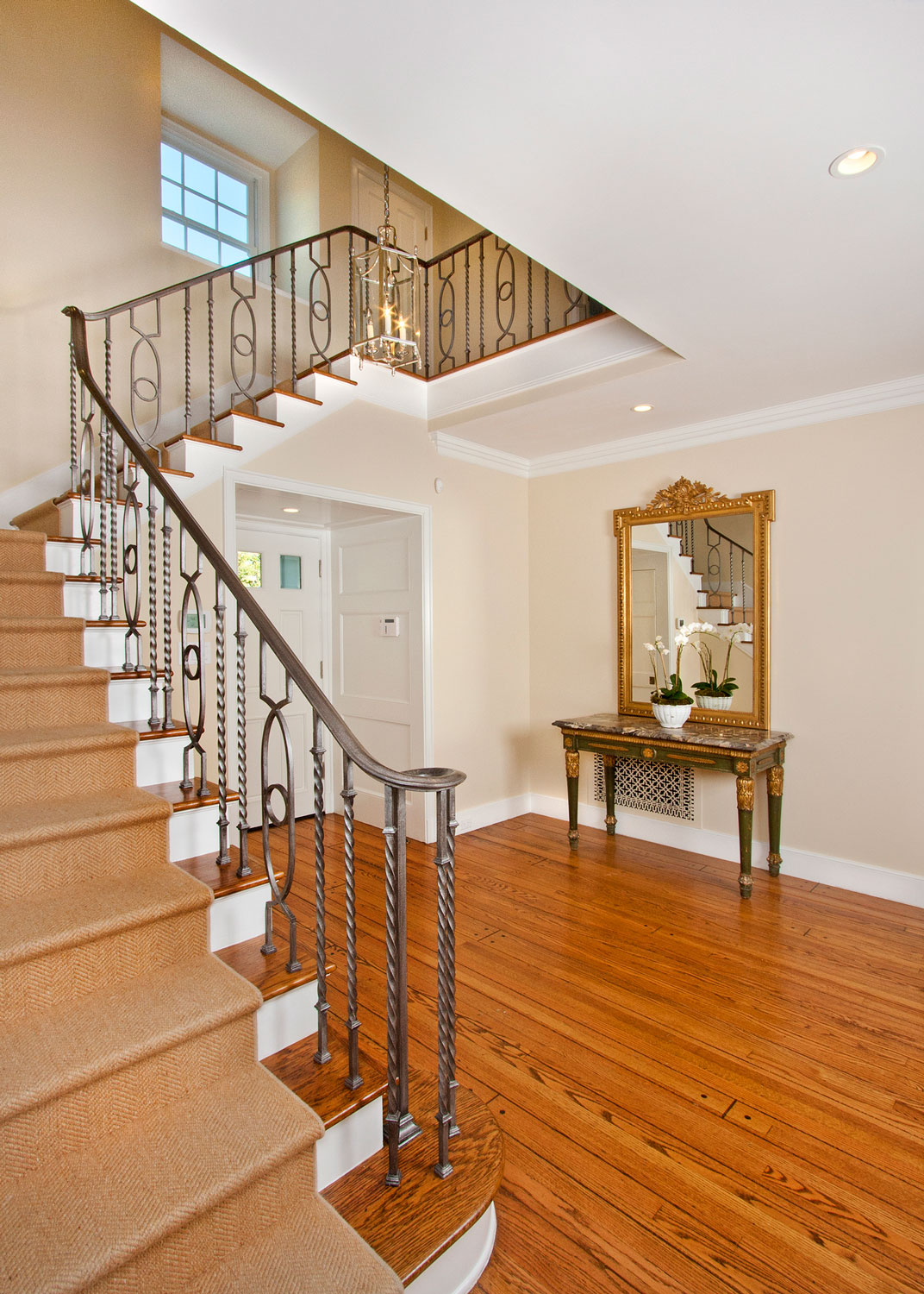 09-front-entry-staircase-iron-railing-gary-drake-general-contractor.jpg