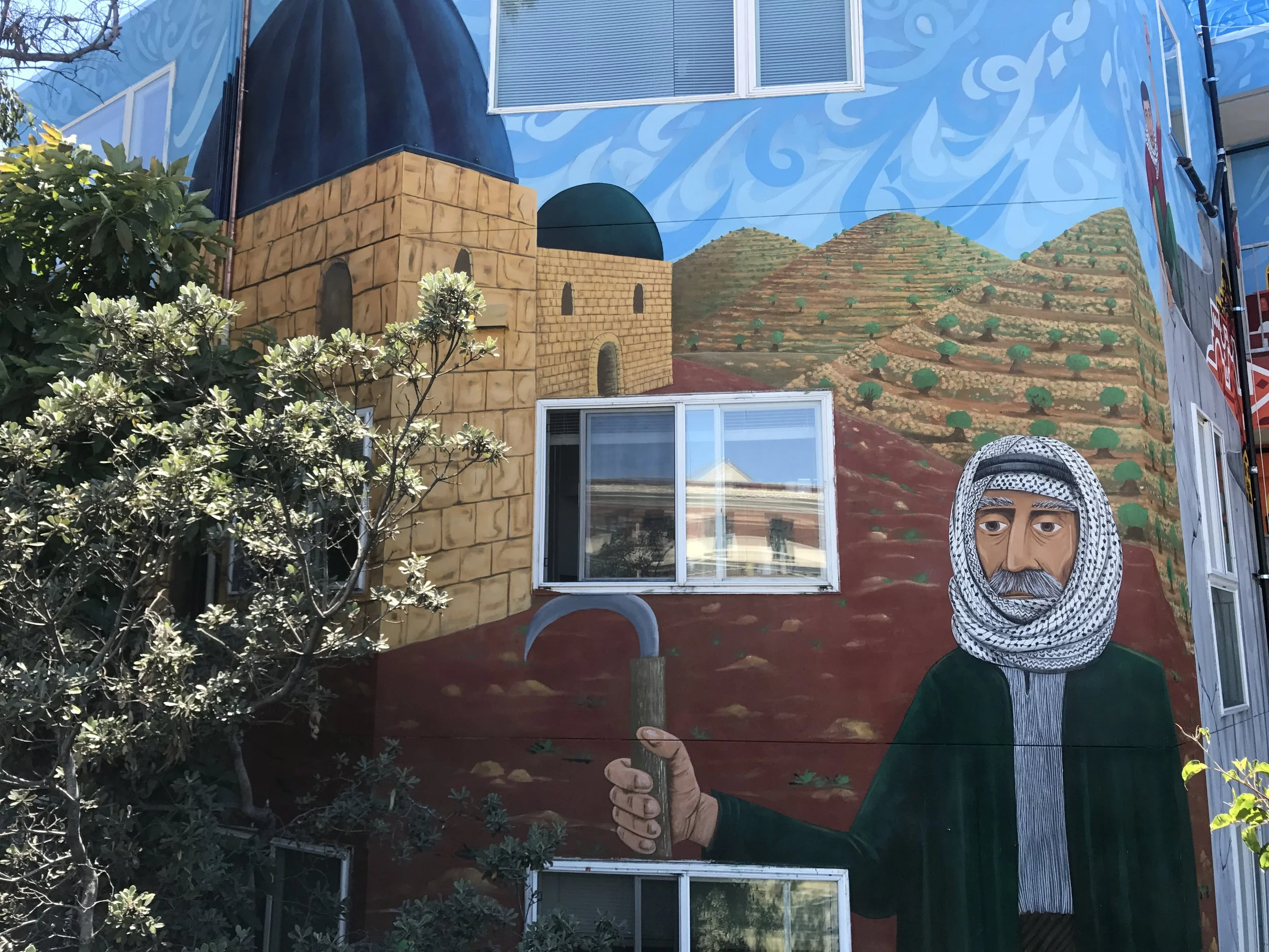  This elder depicted in the mural represents the “Falah” or farmer/peasant tending to his land. Gazaleh wanted to express the hope for “return” in this part of the mural. The elder is somewhat representative of some who never left or was removed from