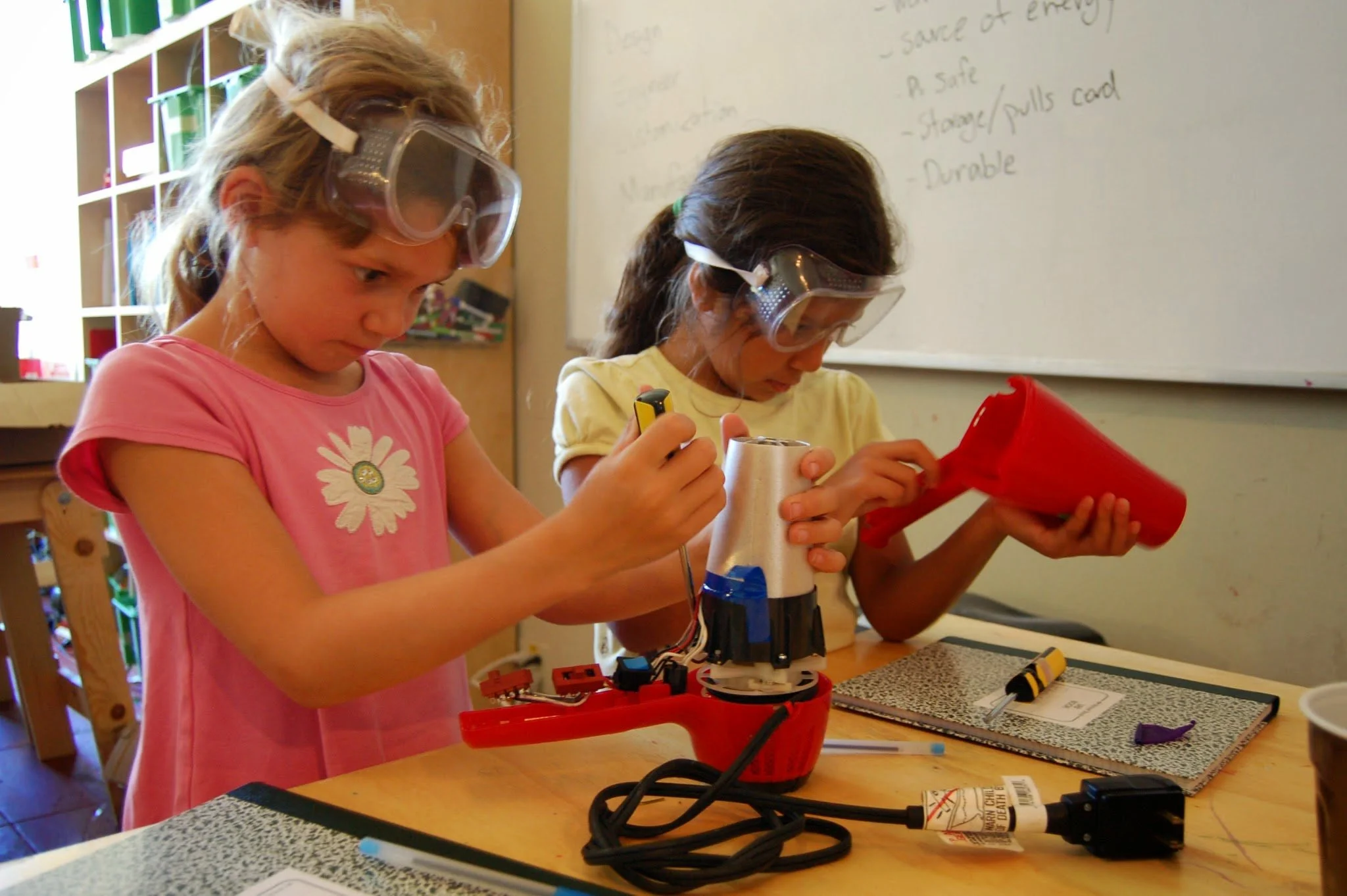Two girls fixing hairdryer - July 2014.JPG