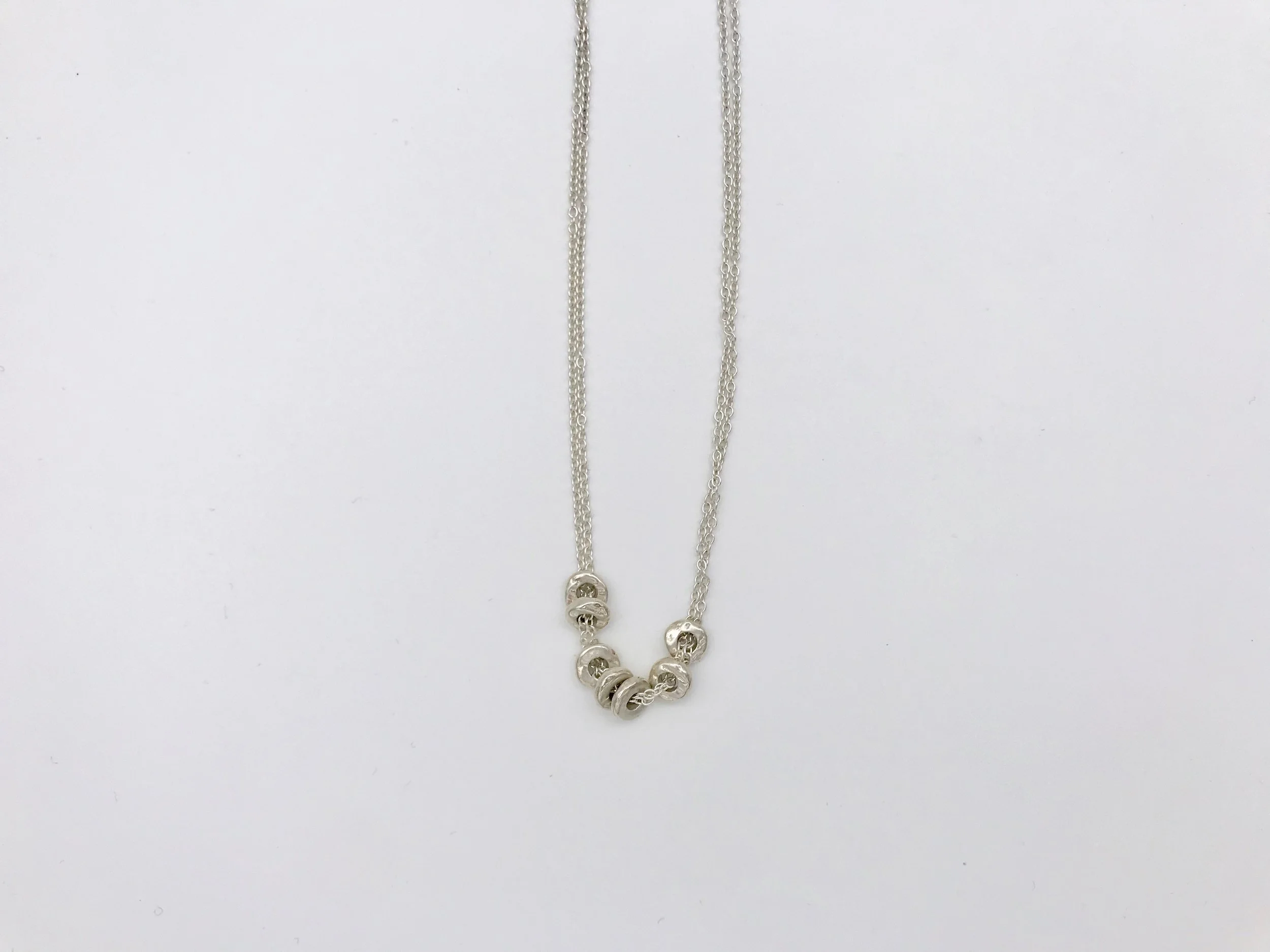 Silver shell beads on a doubled sterling silver chain 
