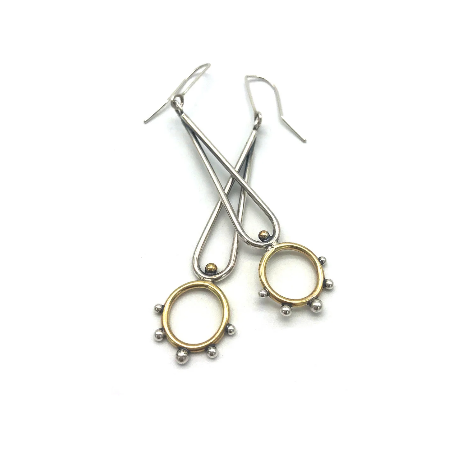 Silver and brass earrings.