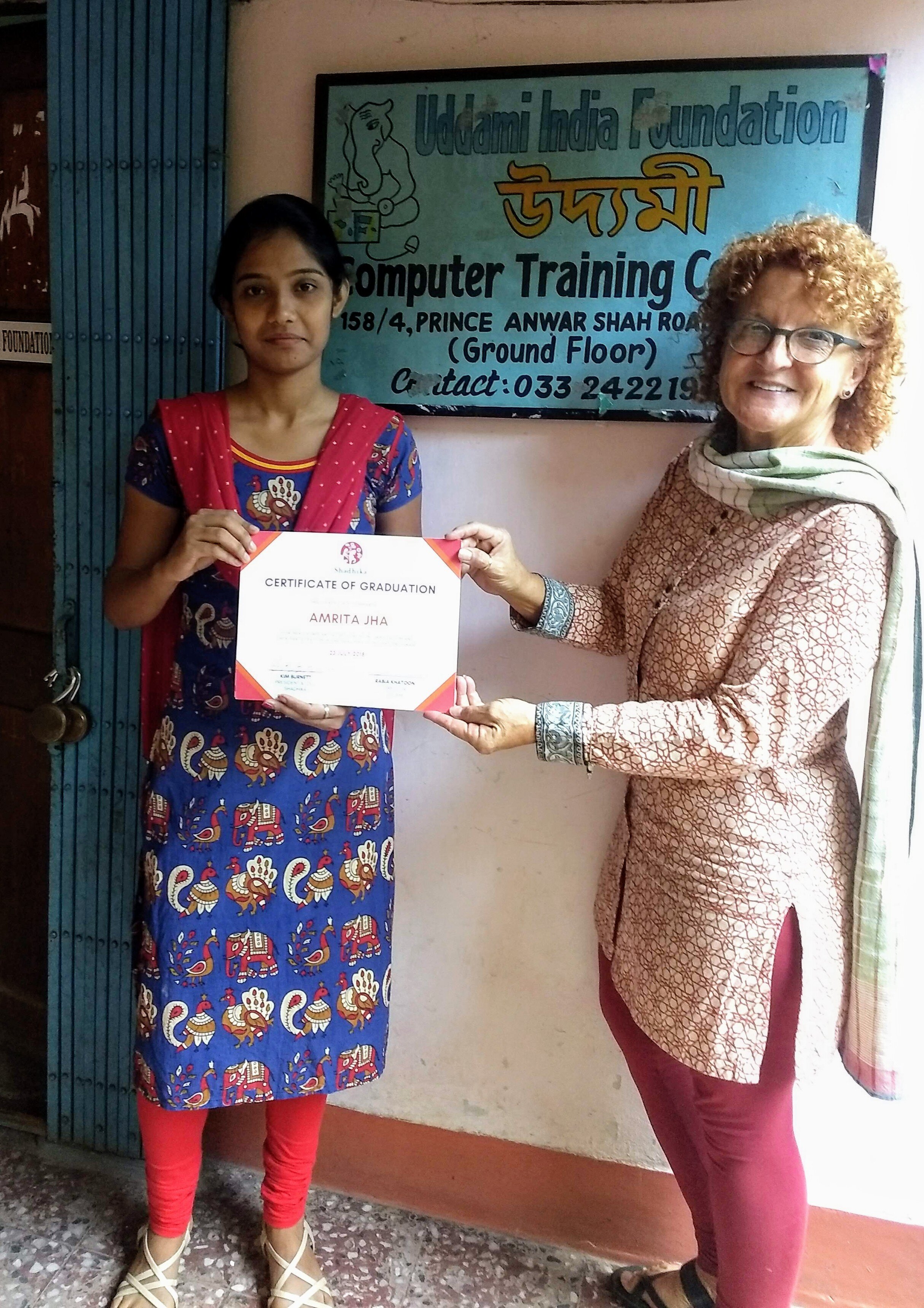 Amrita w Shadhika graduation certificate.jpg