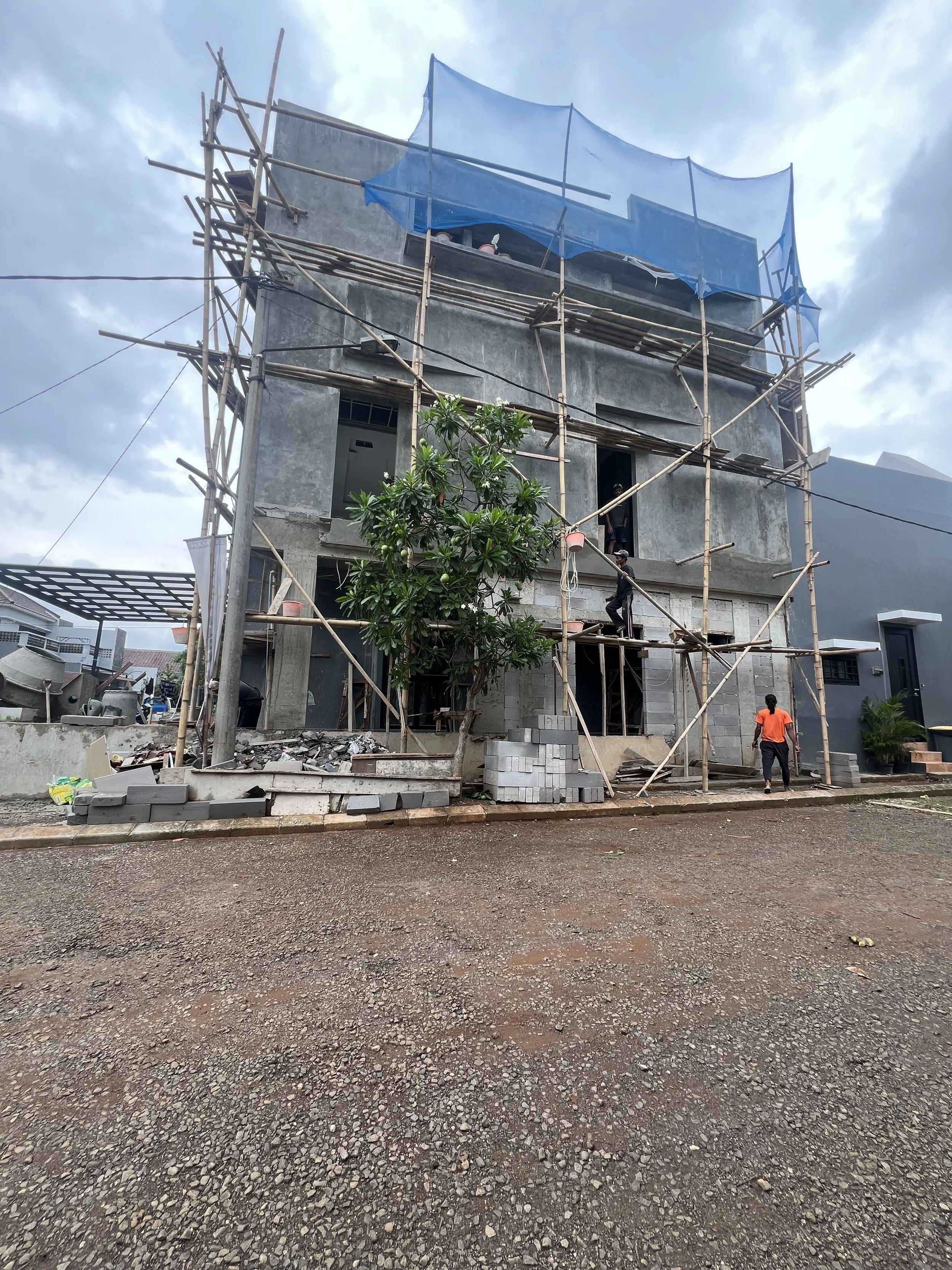 proyek-pembangunan-rumah-hunian-minimalist-cluster-depok-jawa-barat-side-view.jpg