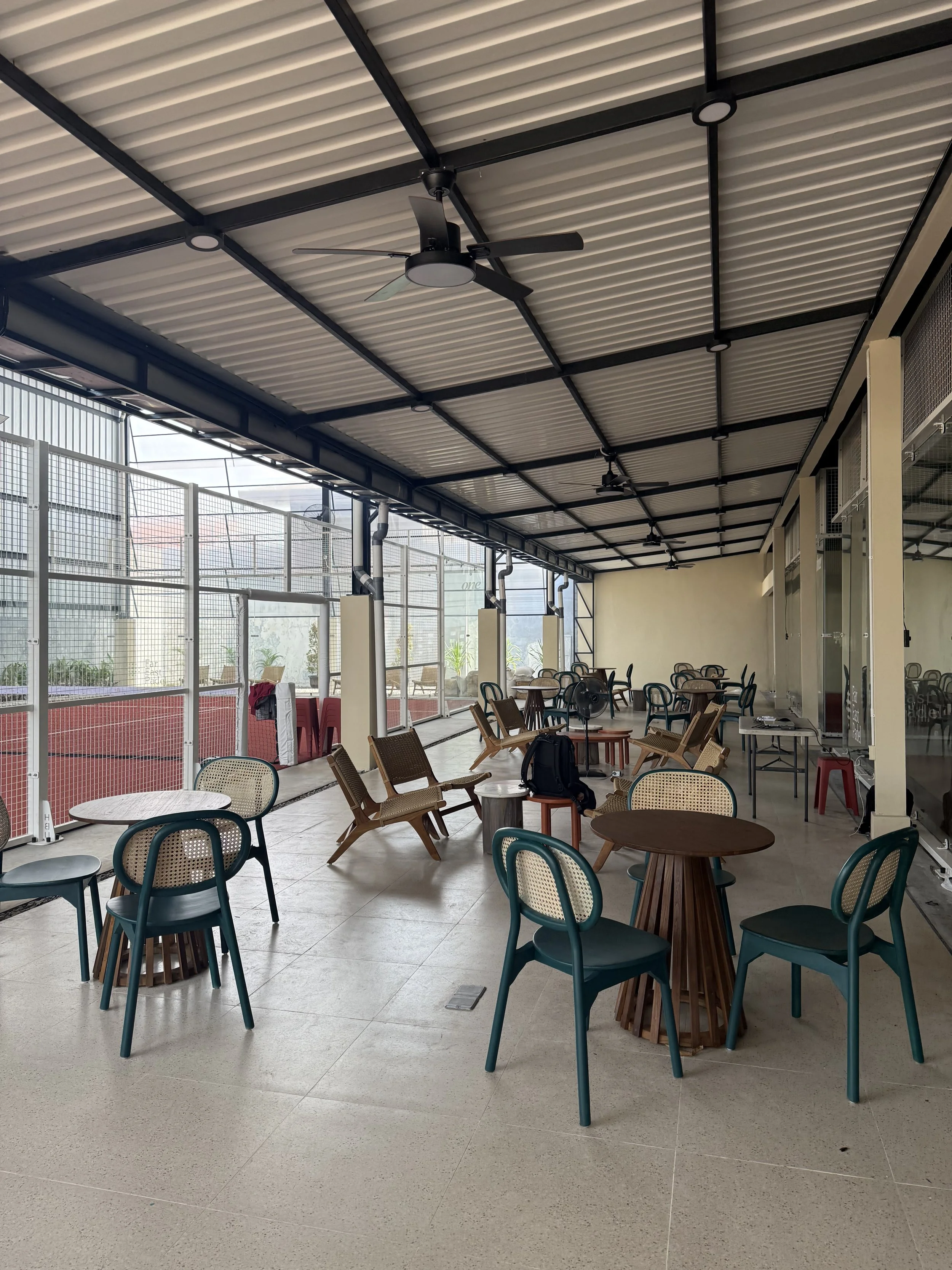 far-east-padel-grove-interior-seating-lounge-view.jpeg